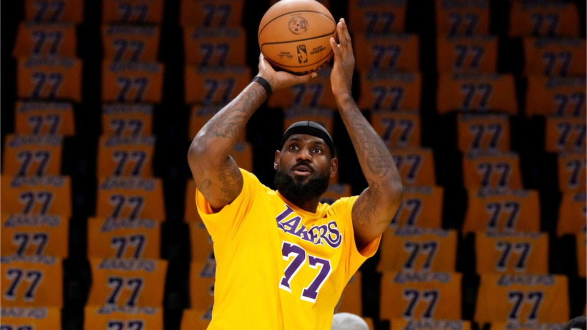 Lebron James is honored by an NBA referee as she imitates this