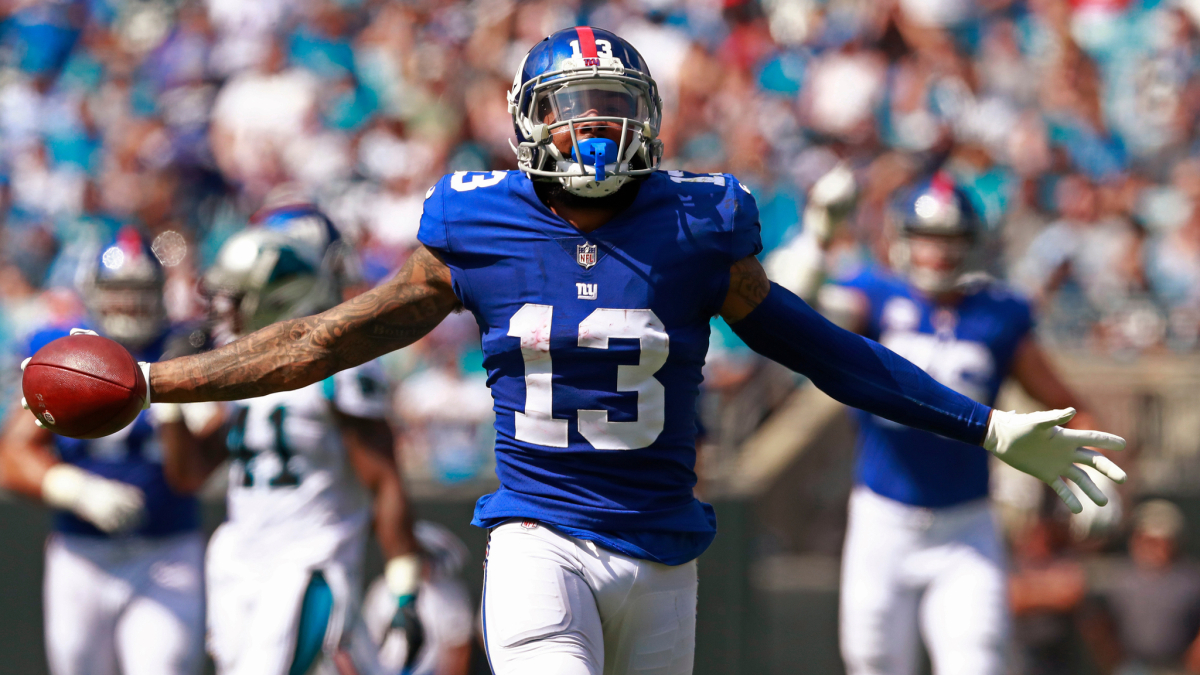 Odell Beckham Jr. smiling in a New York Giants uniform.