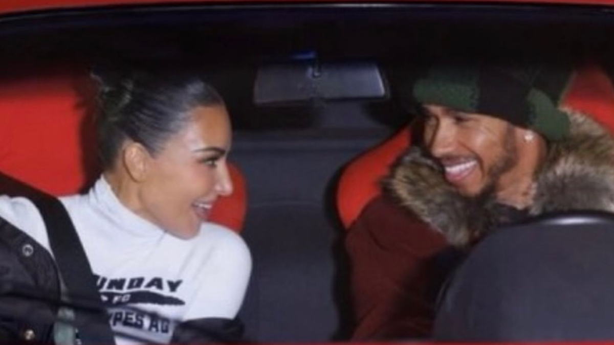 Kim Kardashian and Lewis Hamilton share beach kiss caught on camera | MARCA