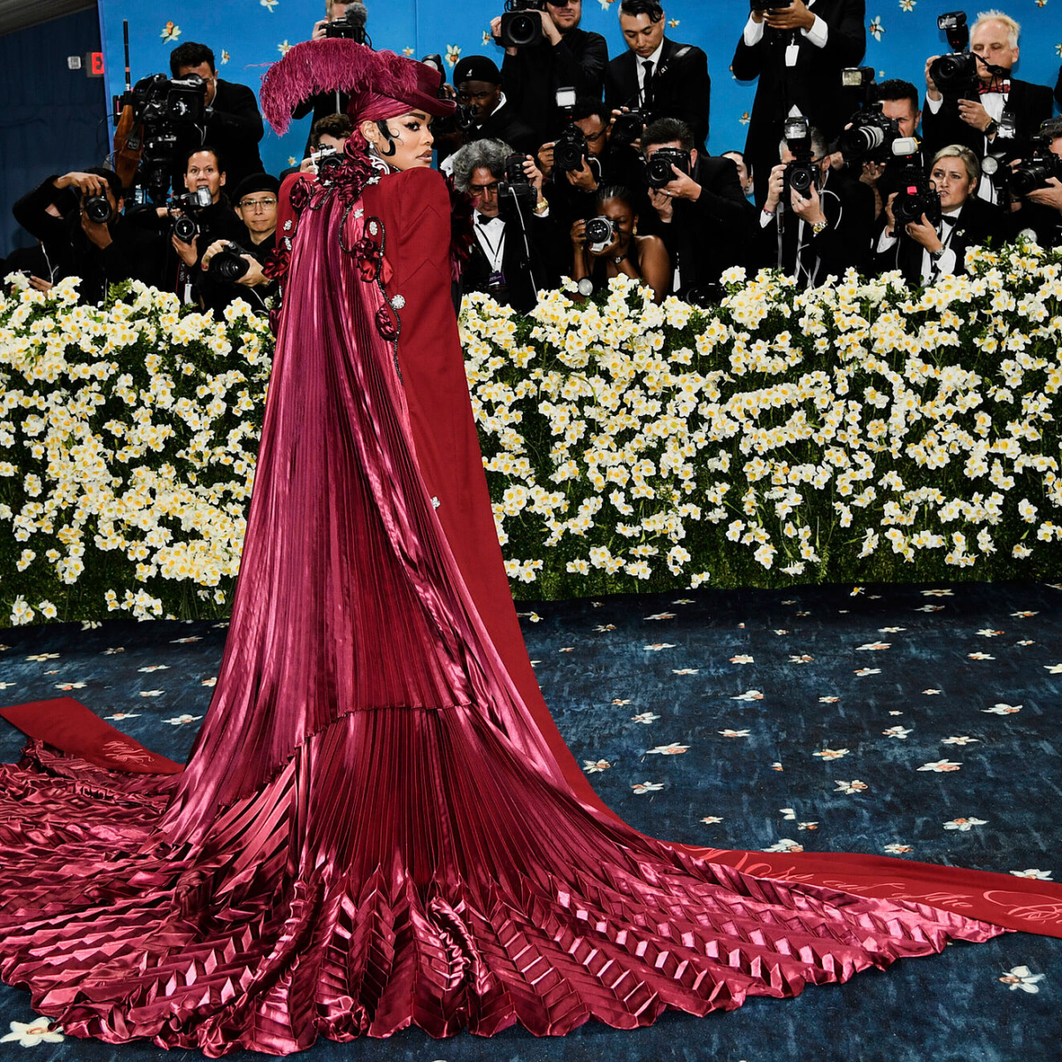 met gala 2025 red dress Gabby Thomas Wears Stunning Red Gown at the 2025 Met Gala