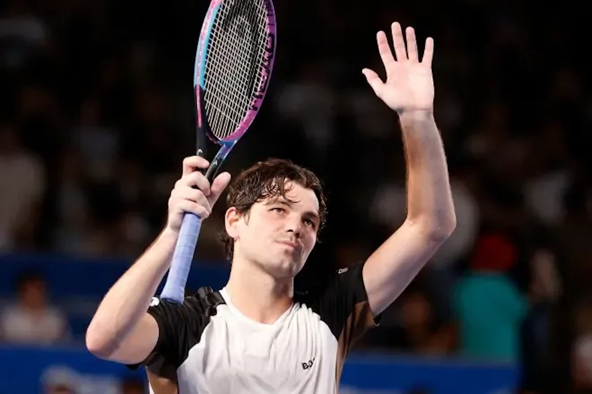 Fritz waves to the crowd in Tokyo.
