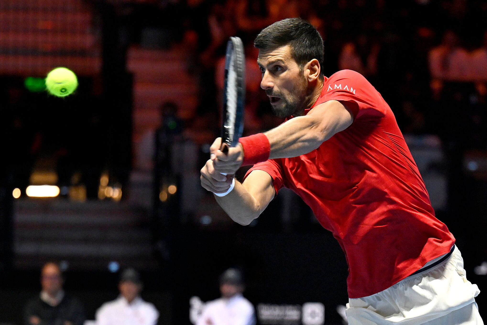 Djokovic in action, fully focused.