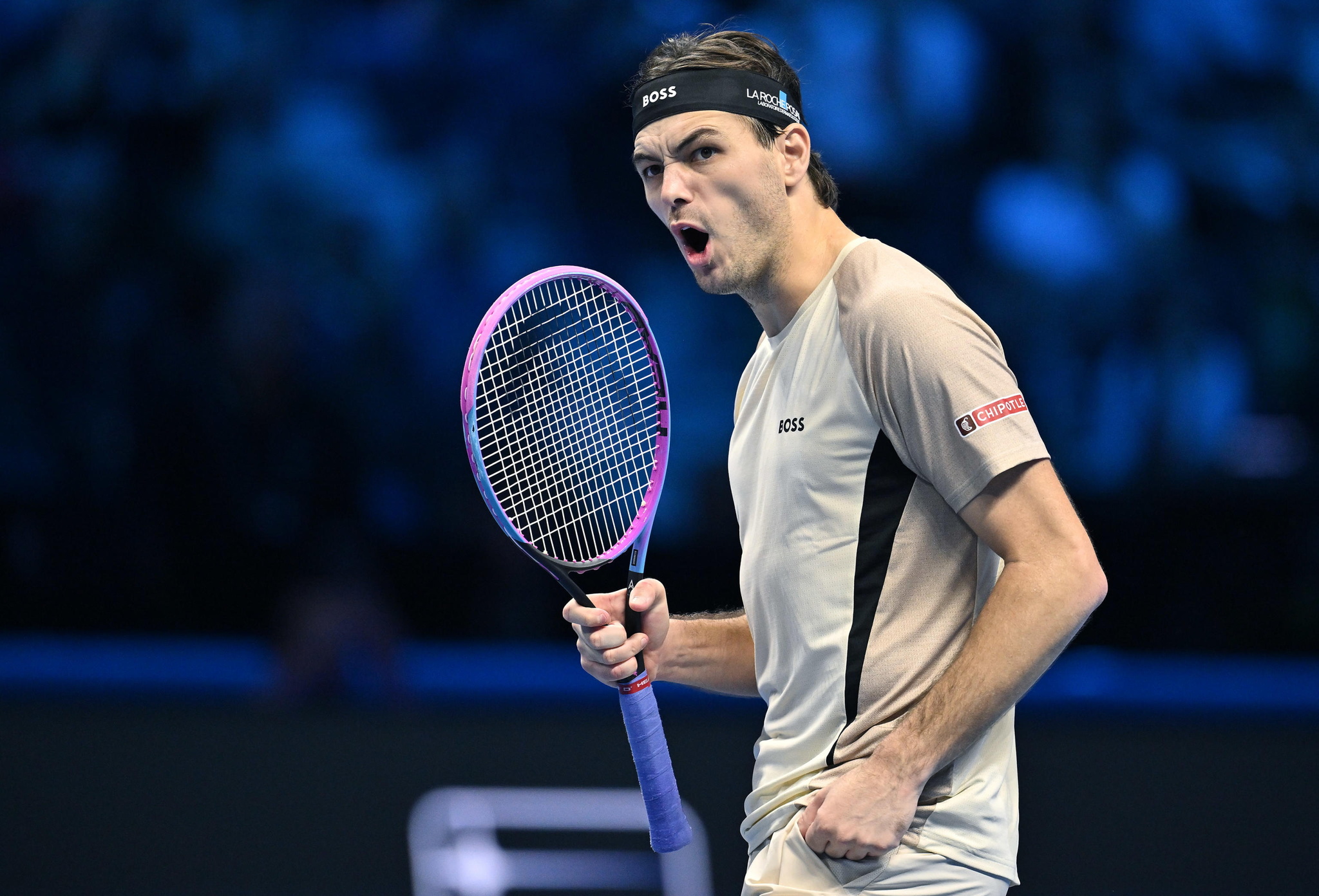 Taylor Fritz of USA reacts during his Singles Round Robin match against Carlos Alcaraz of Spain at the ATP Finals.