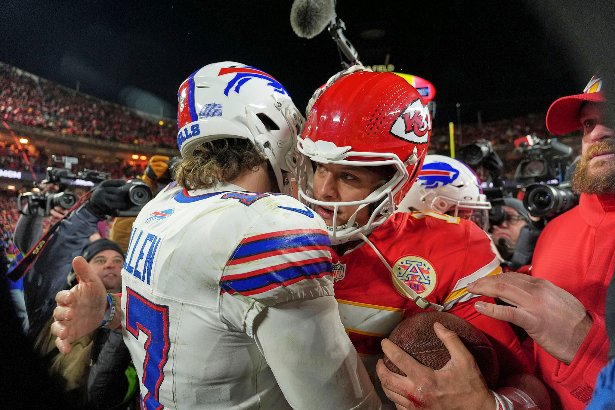 Buffalo Bills quarterback Josh Allen, left, and Kansas City Chiefs quarterback Patrick Mahomes hug after the AFC Championship NFL football game