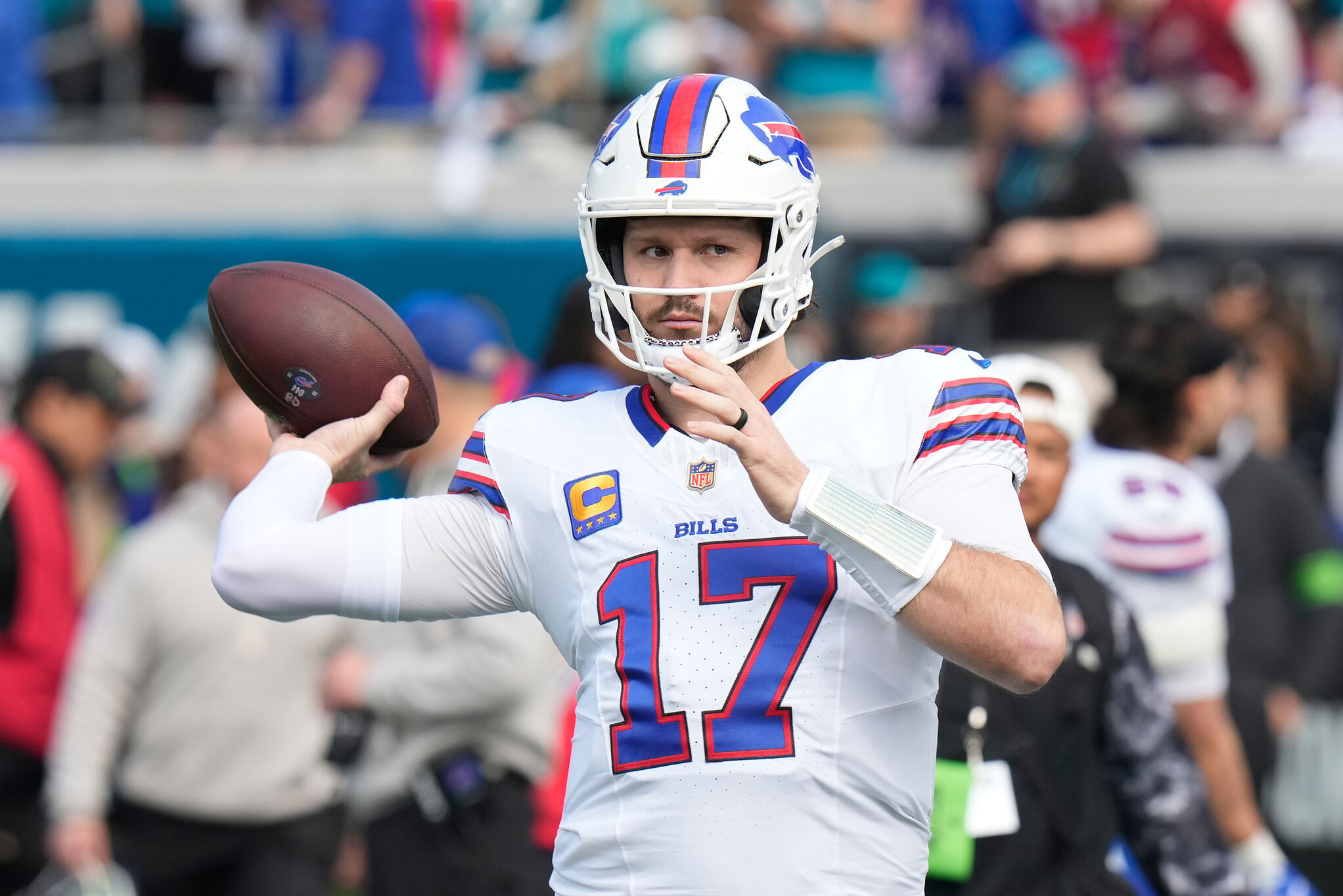 Buffalo Bills quarterback Josh Allen works out prior to an NFL wild-card playoff football game against the Jacksonville Jaguars