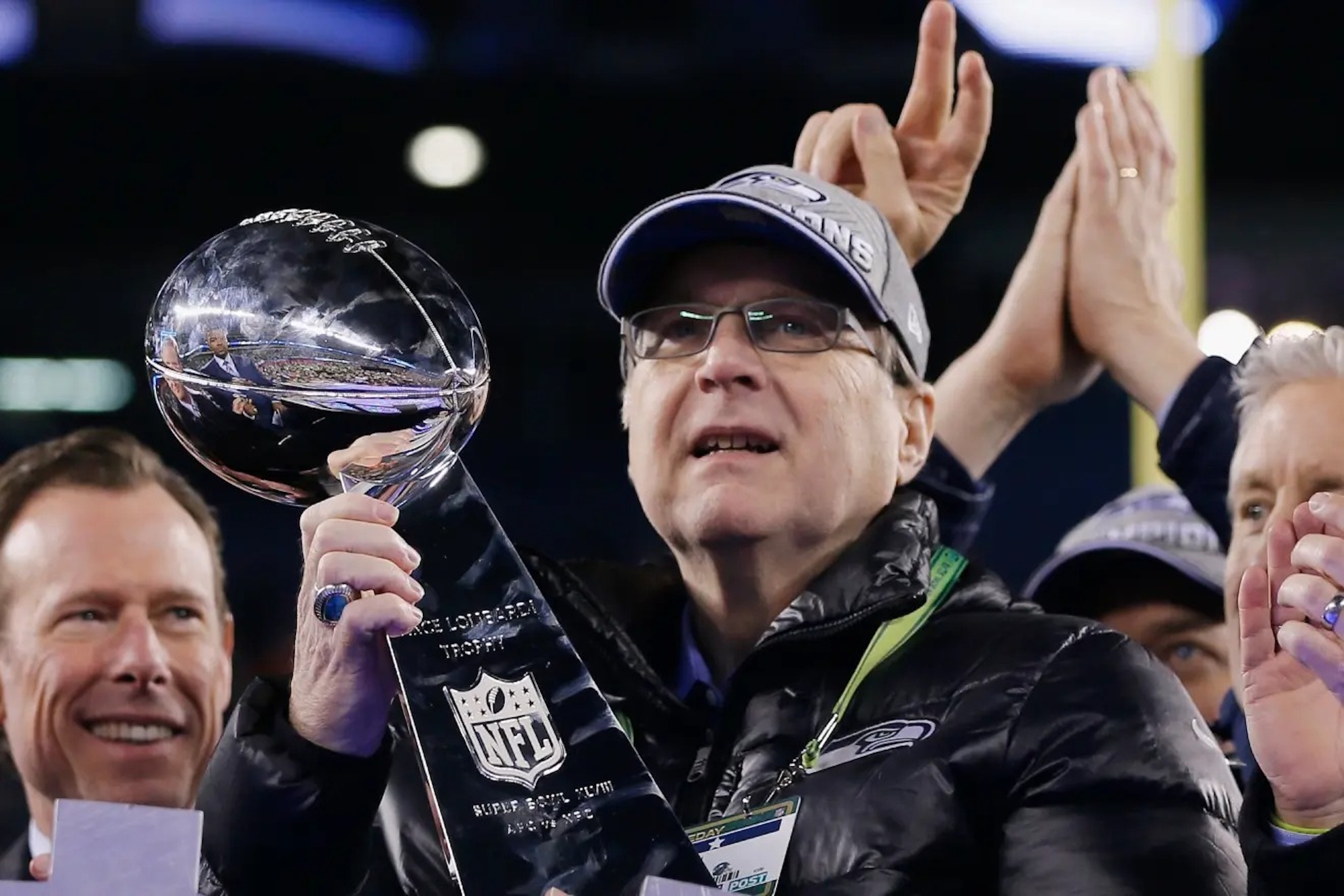 Paul Allen with the Vince Lombardi Trophy after the Seahawks won the Super Bowl in 2014.