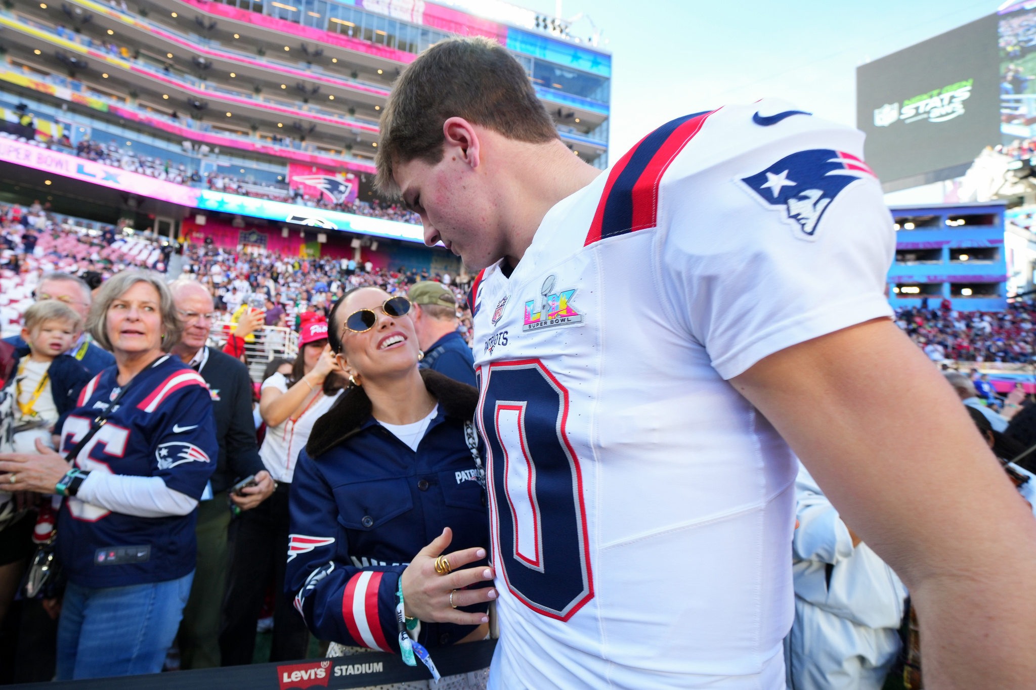 New England Patriots quarterback Drake Maye hugged his wife Anne Michael before the Super Bowl