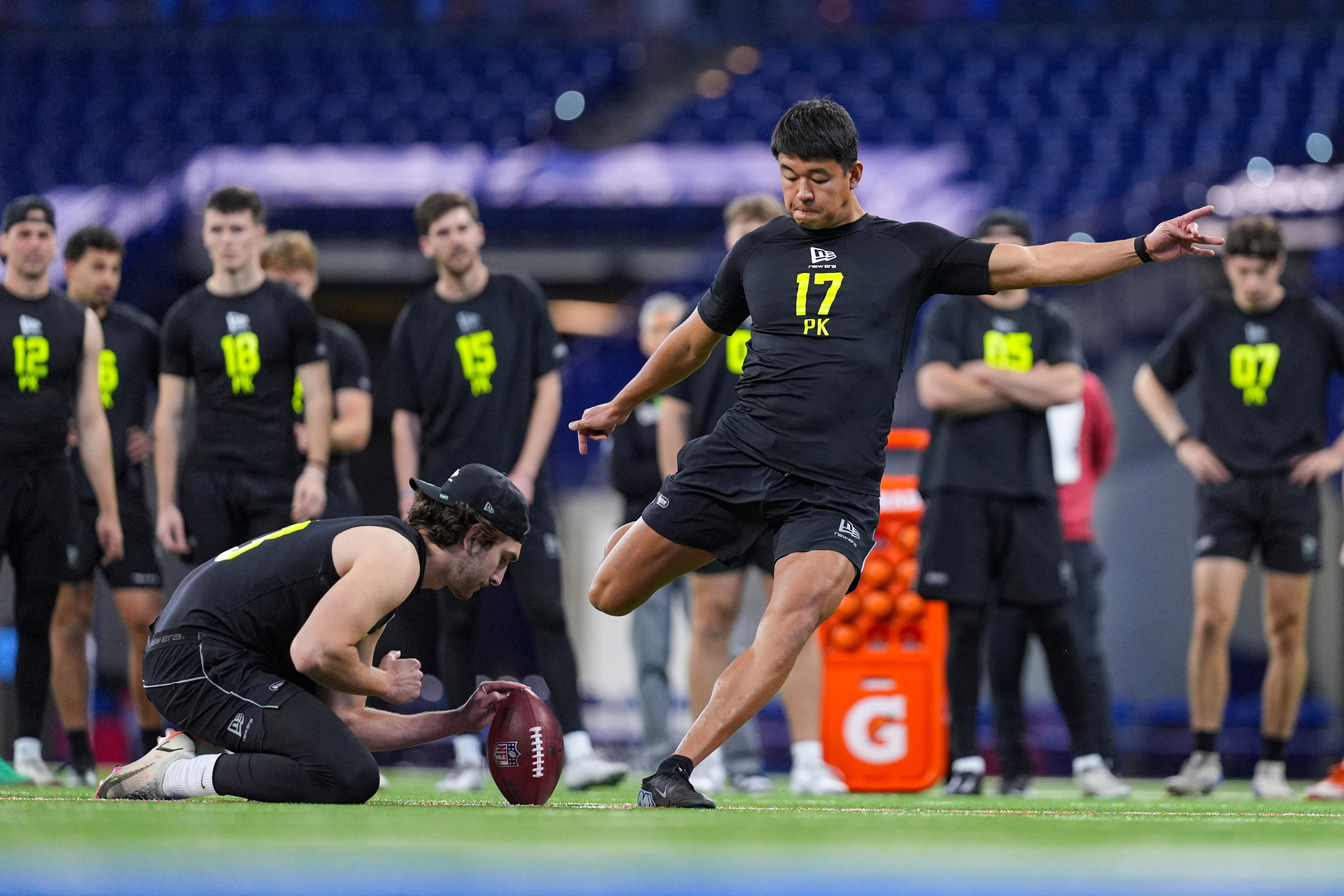 International Player Pathway participant kicker Kansei Matsuzawa, of Japan, kicks at the NFL football scouting combine