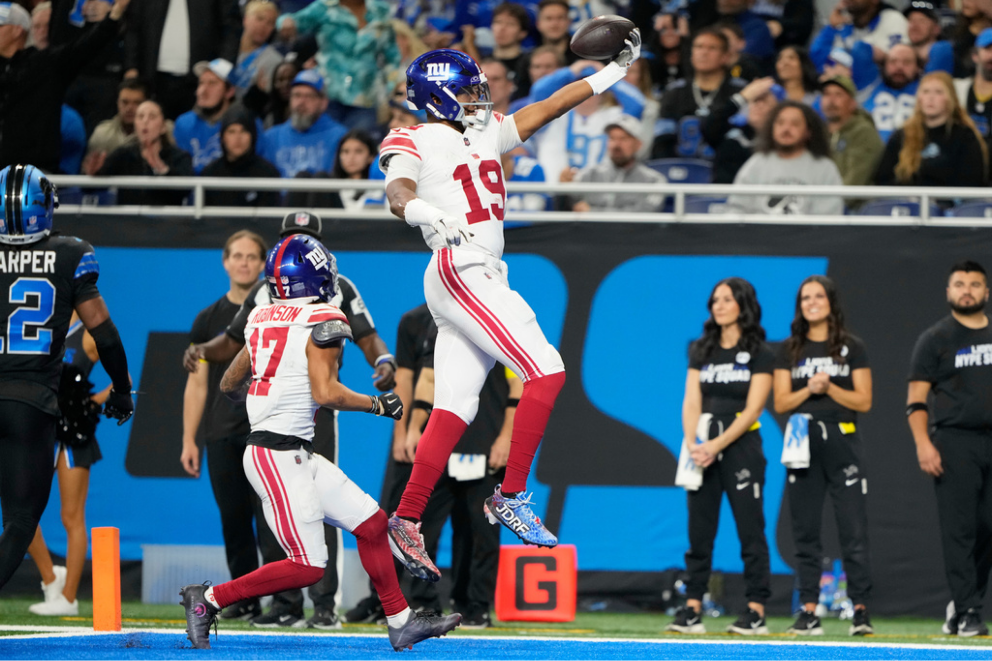 New York Giants quarterback Jameis Winston (19) celebrates his touchdown catch against the New York Giants as former New York Giants wide receiver Wan'Dale Robinson