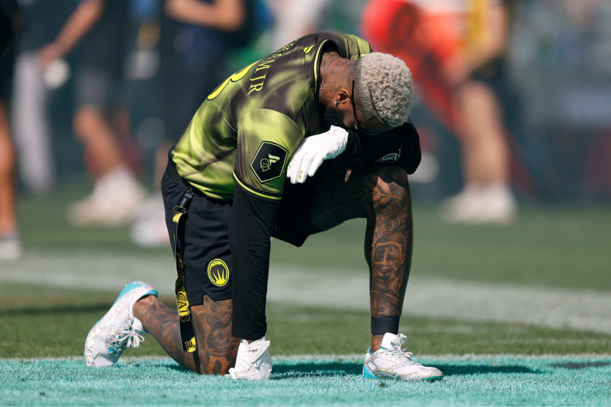 Wildcats FFC's Odell Beckham Jr. takes a moment before facing off against the Founders FFC during the Fanatics Flag Football Classic