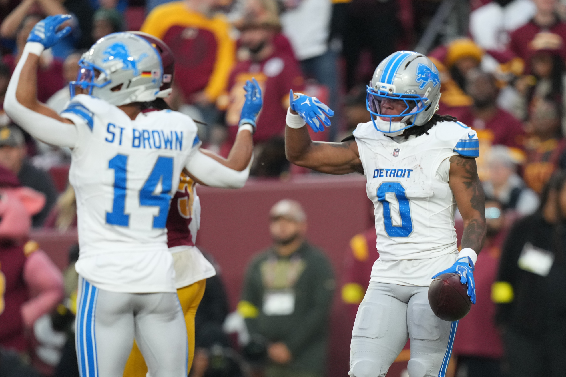 Detroit Lions RB Jahmyr Gibbs (right) may have to replace his teammate Amon-Ra St. Brown as a WR