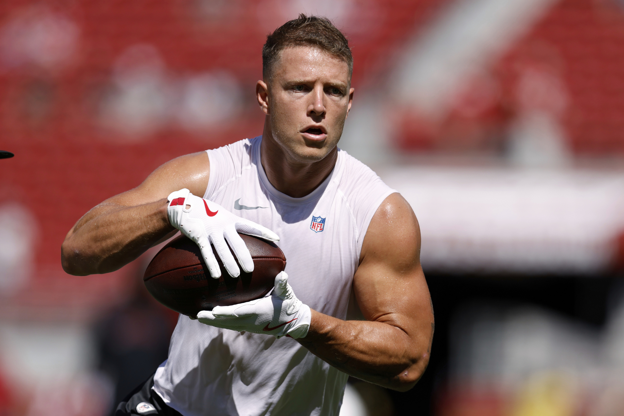 San Francisco 49ers running back Christian McCaffrey warms up prior to an NFL football game against the Arizona Cardinals, Sunday, Sept. 21, 2025, in Santa Clara. (AP Photo/Sergio Estrada)