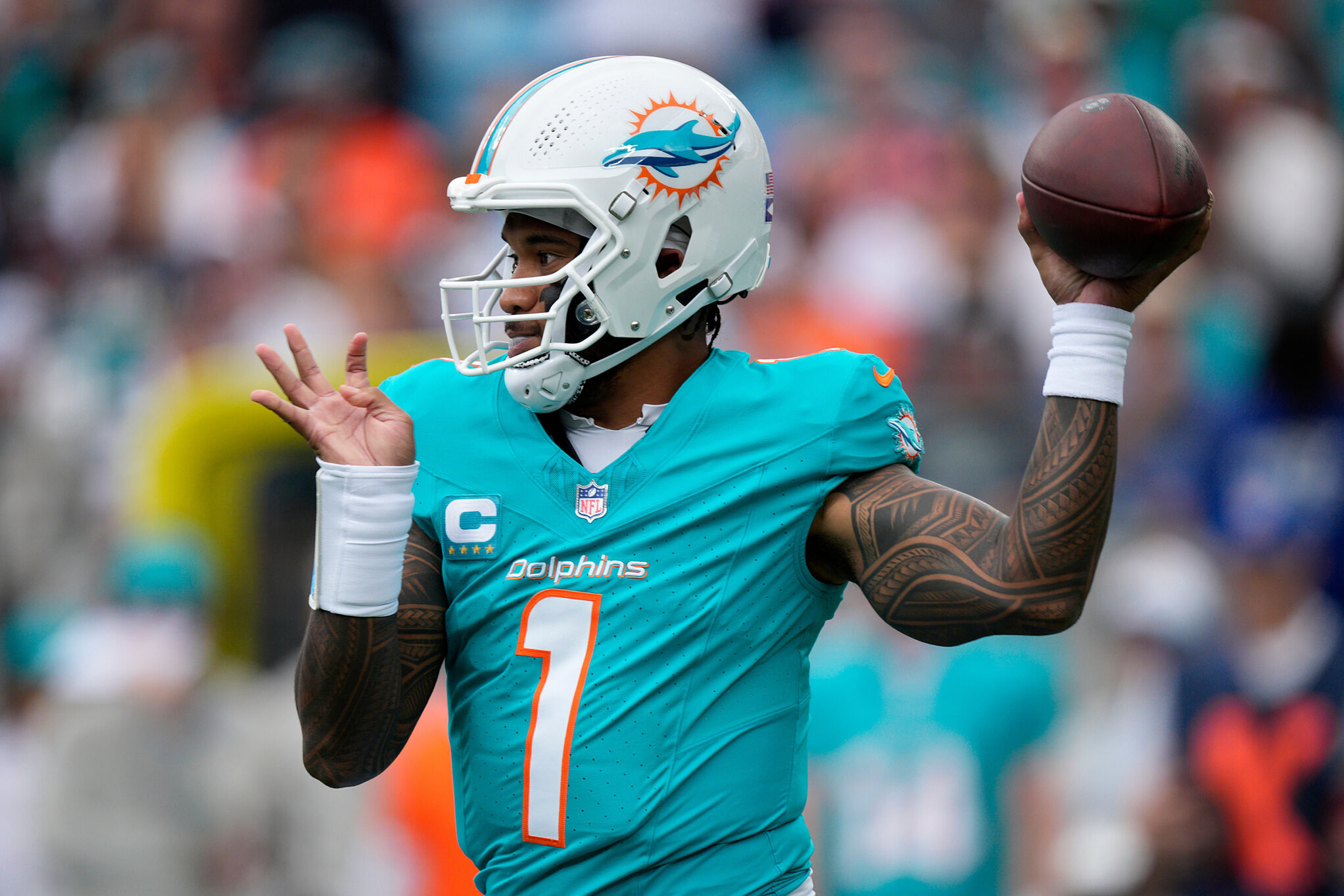 Miami Dolphins quarterback lt;HIT gt;Tua lt;/HIT gt; lt;HIT gt;Tagovailoa lt;/HIT gt; passes against the Carolina Panthers during the first half of an NFL football game, Sunday, Oct. 5, 2025, in Charlotte, N.C. (AP Photo/Jacob Kupferman)
