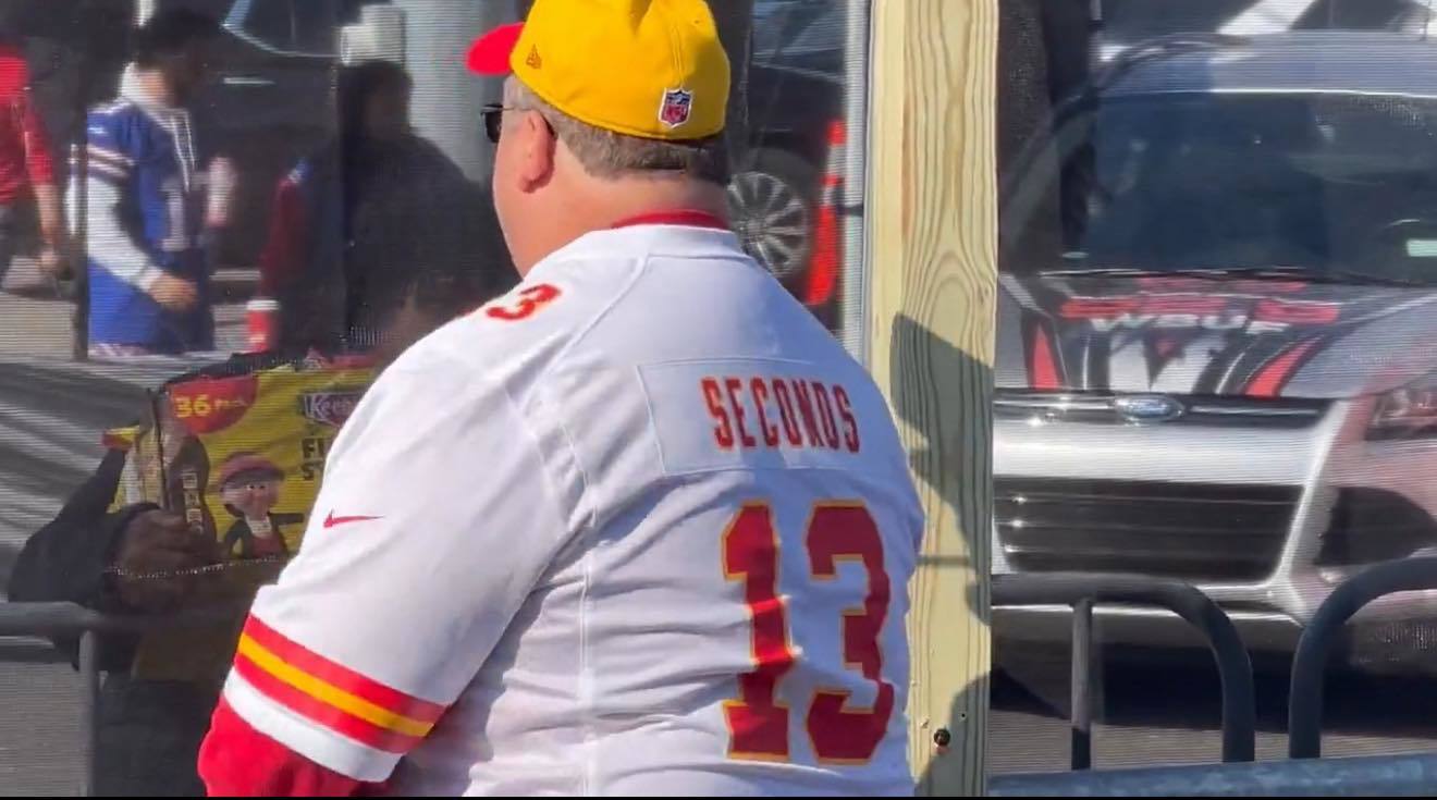 Fan wearing a "13 seconds" jersey