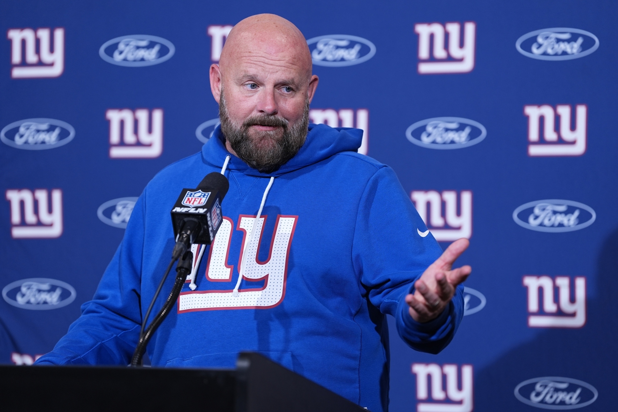 The coach's retreat from the spotlight fuels speculation linking him to Philadelphia's $8.3 billion franchise