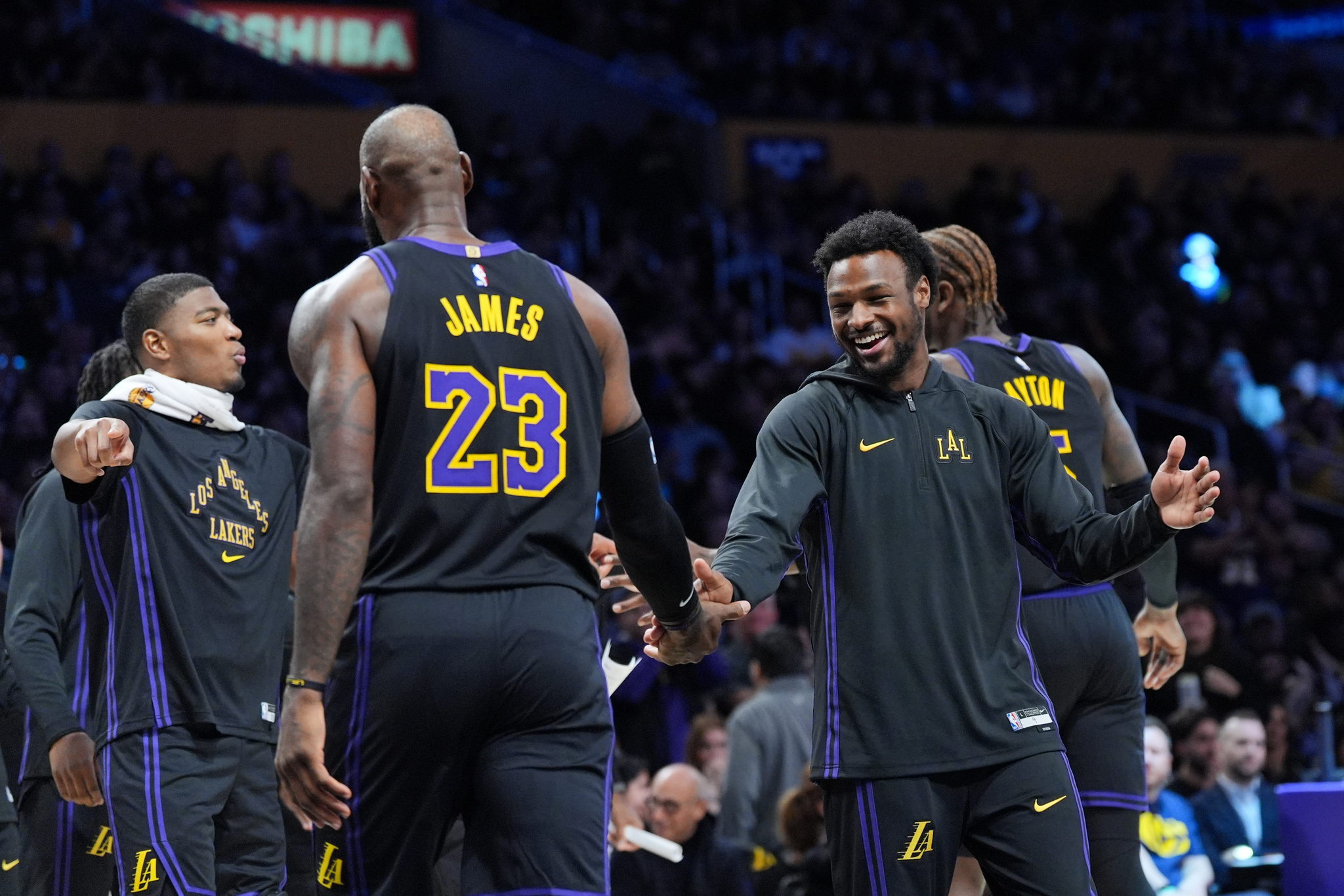 Bronny James greets LeBron James