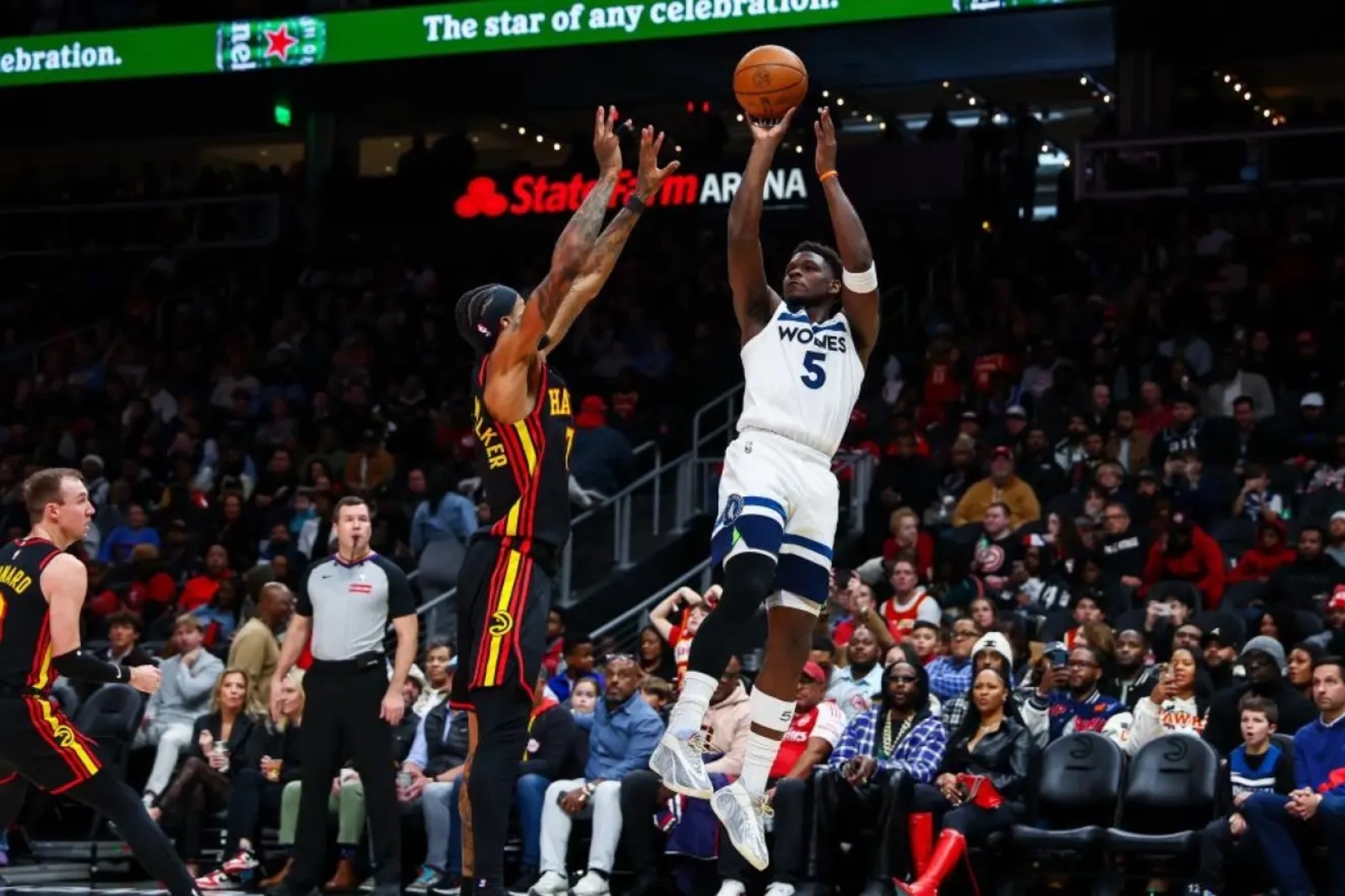 Anthony Edwards shoots against Nickeil Alexander-Walker