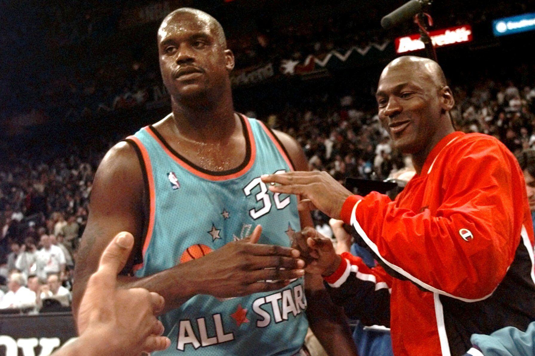 Chicago Bulls' Michael Jordan, right, of the East jokes with Orlando Magics' Shaquille O'Neal after the NBA All Star game Sunday