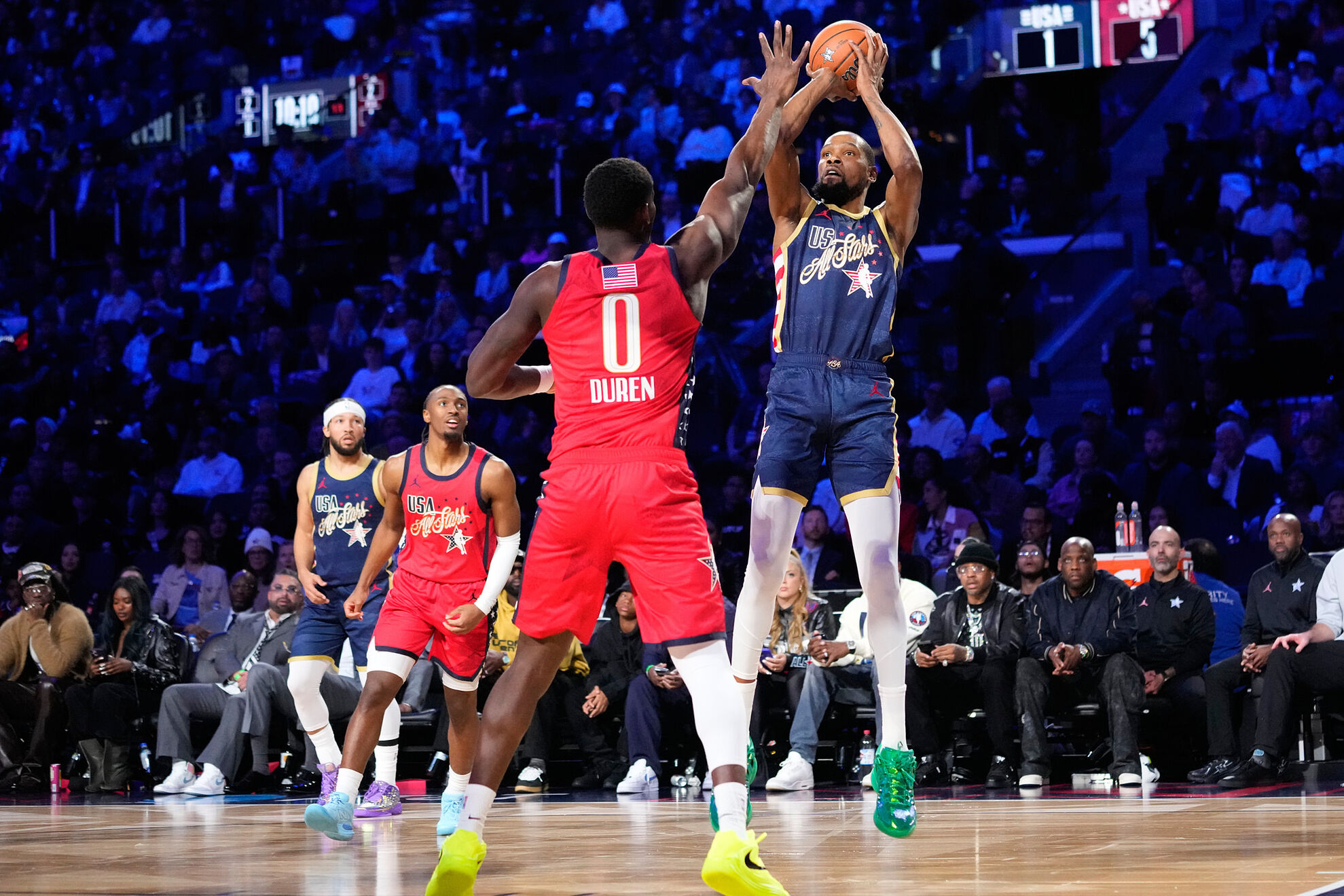 USA Stripes forward Kevin Durant shoots over USA Stars forward Jalen Duren