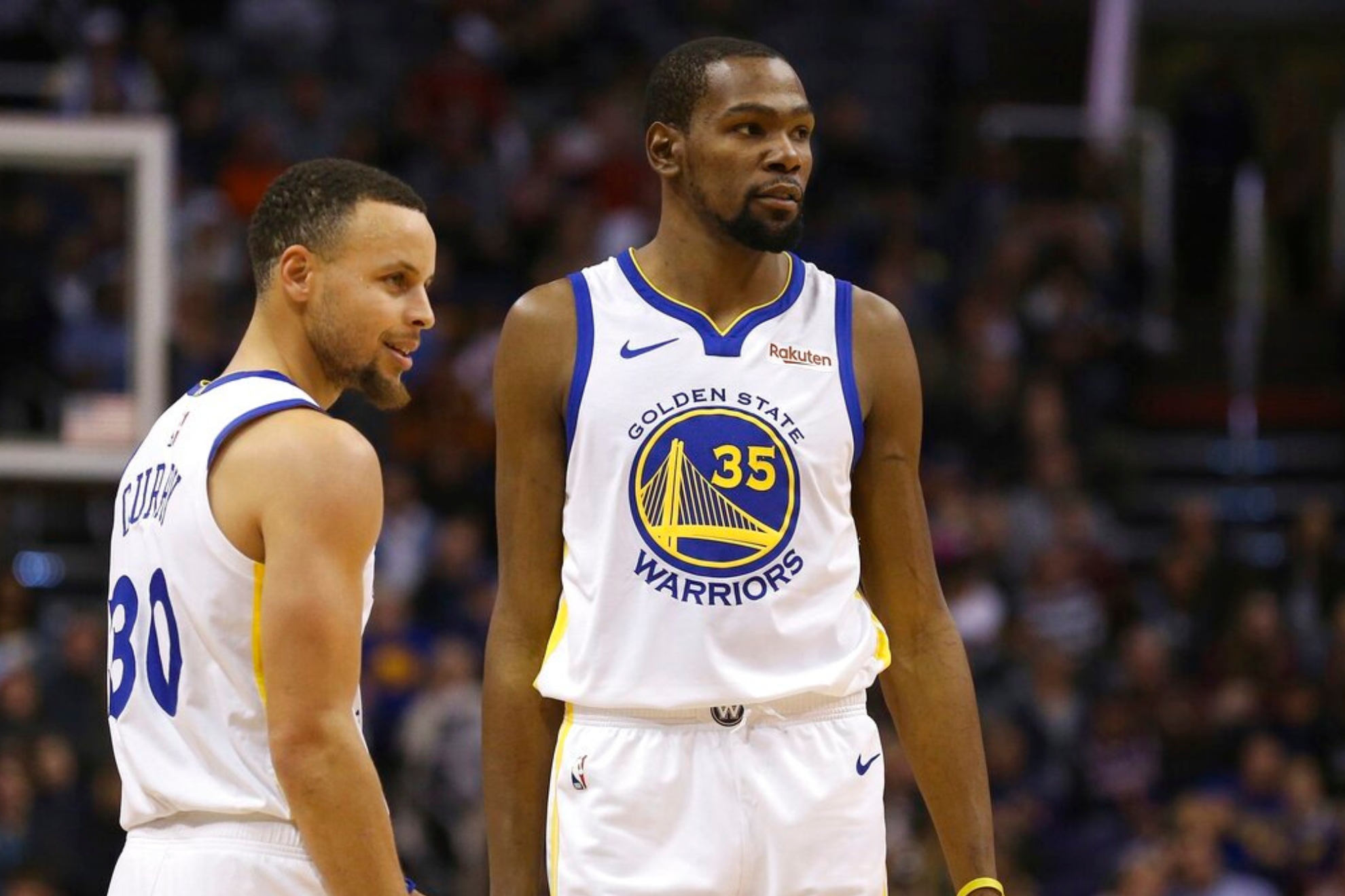 Golden State Warriors guard Stephen Curry (30) and forward Kevin Durant (35)