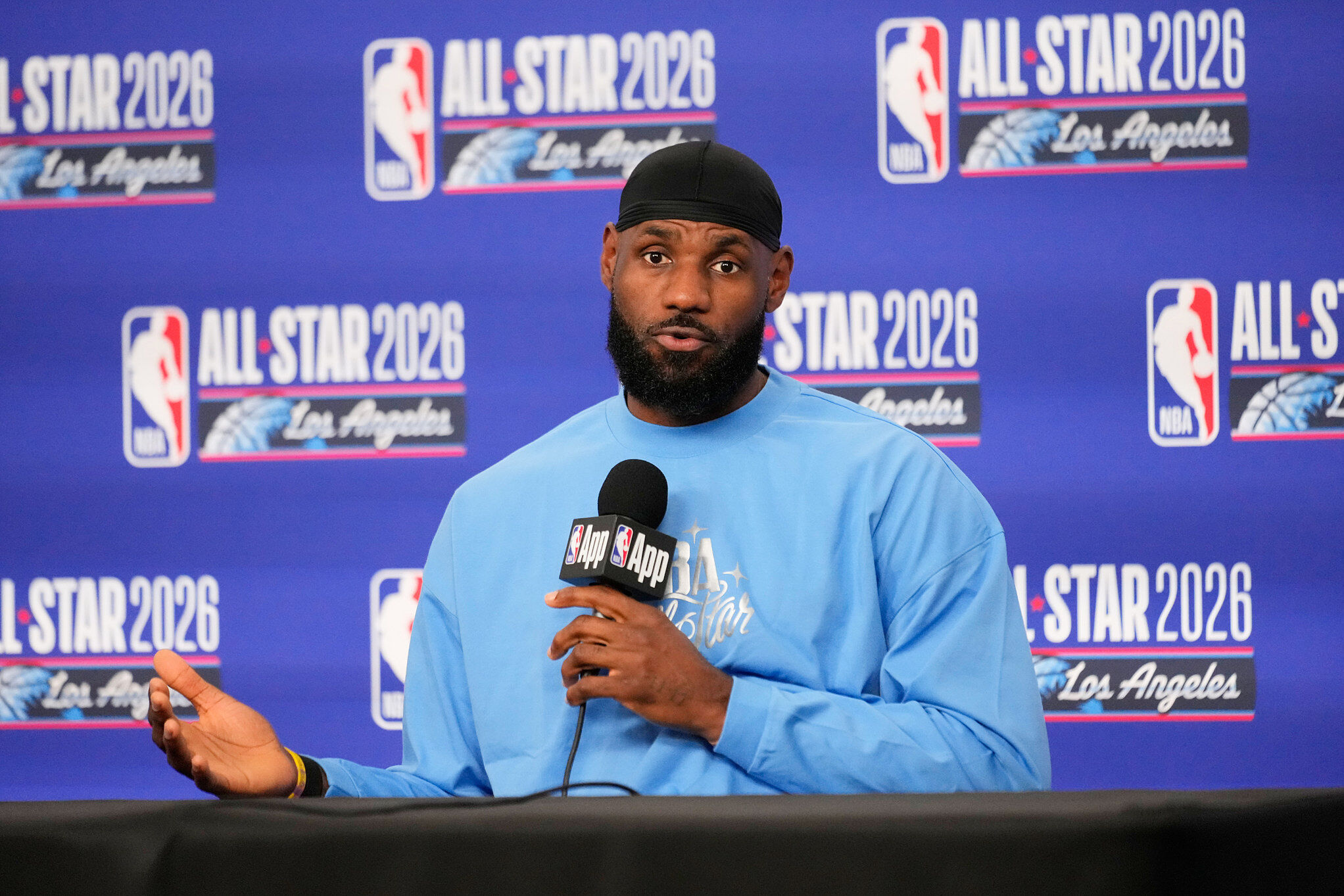 USA Stripes forward LeBron James (23) answers questions before the NBA All-Star basketball game