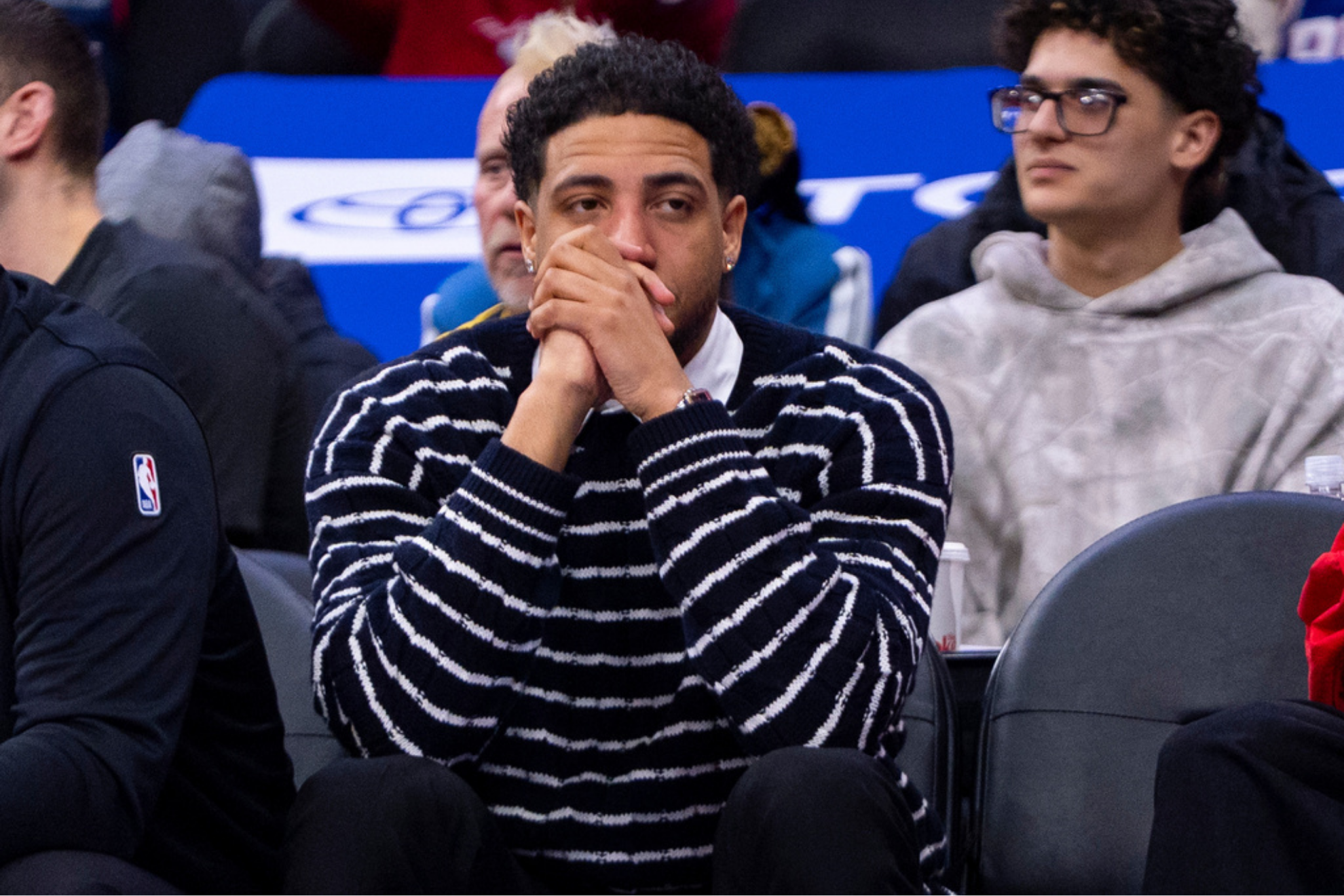 Indiana Pacers' Tyrese Haliburton looks on from the bench during an NBA basketball game against the Philadelphia 76ers