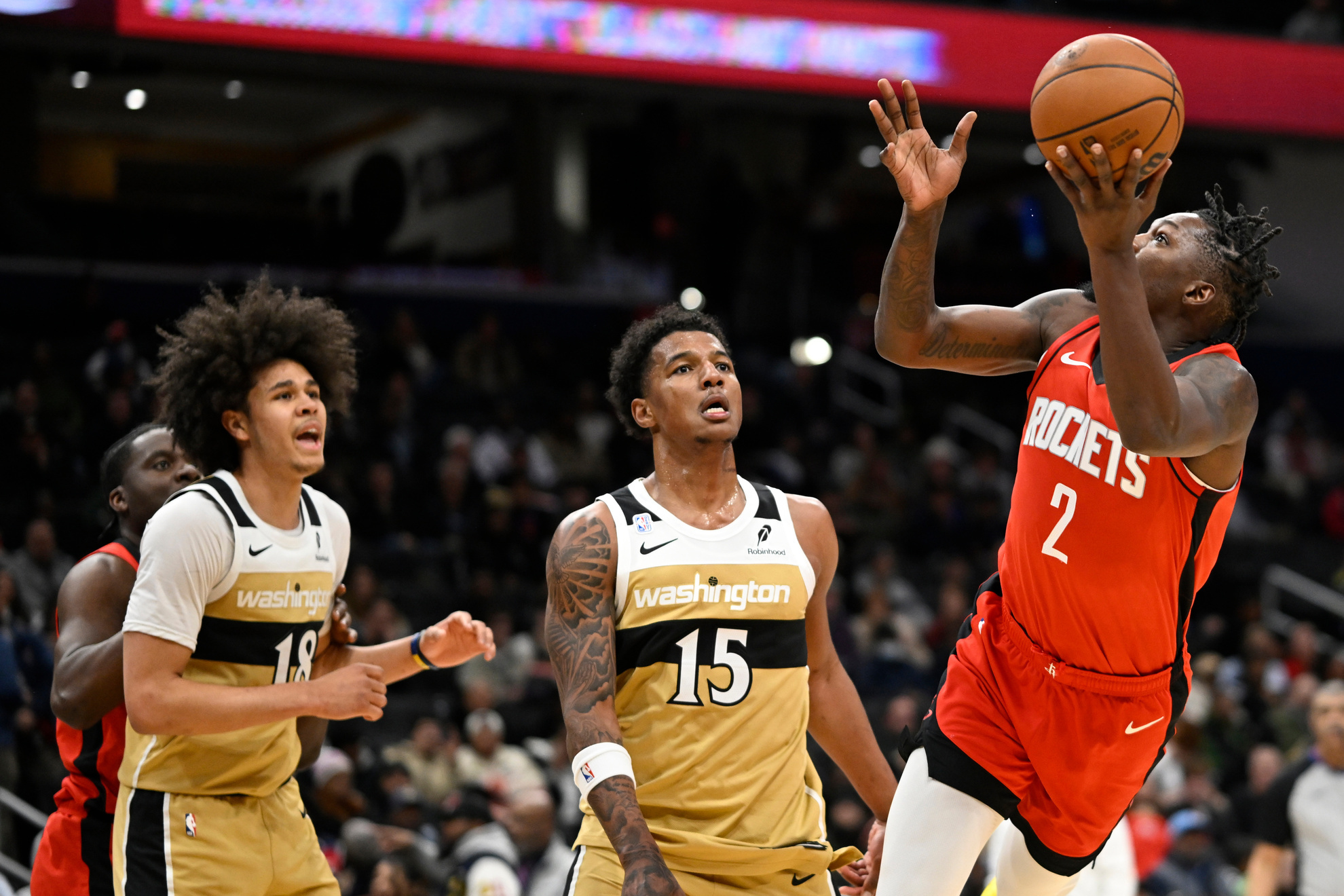Houston Rockets forward Dorian Finney-Smith goes to shoot against Washington Wizards Julian Reese