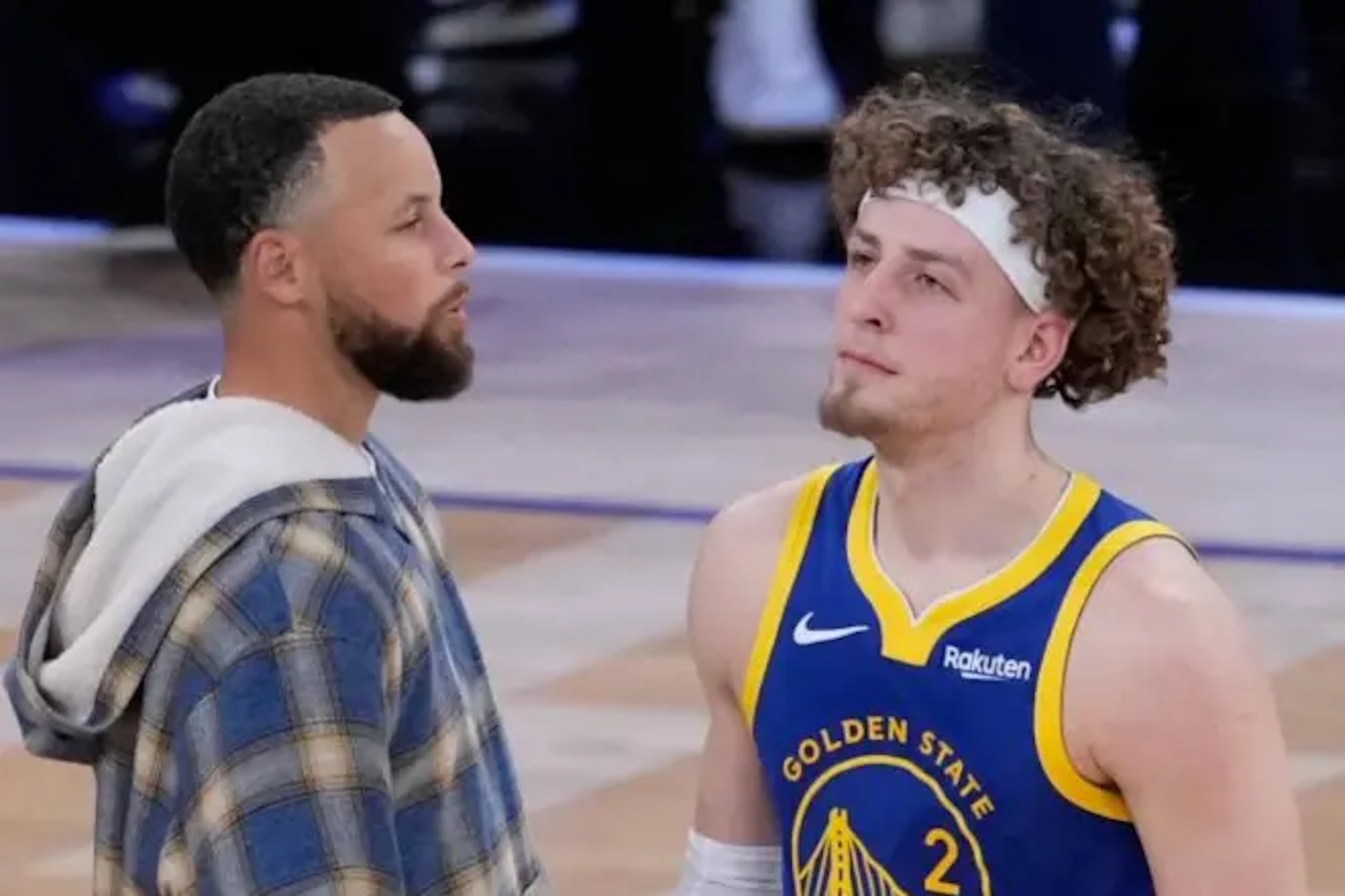 Stephen Curry and Brandin Podziemsky during the game against the Knicks.
