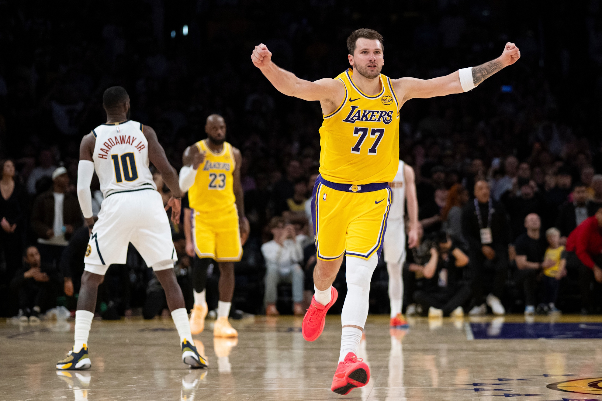 Lakers guard Luka Doncic gestures after the team defeats the Denver Nuggets.