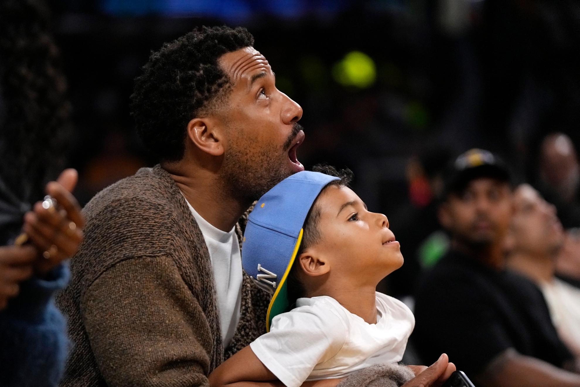 Maverick Carter watches during the 2024 playoff game between the Los Angeles Lakers and the Denver Nuggets.