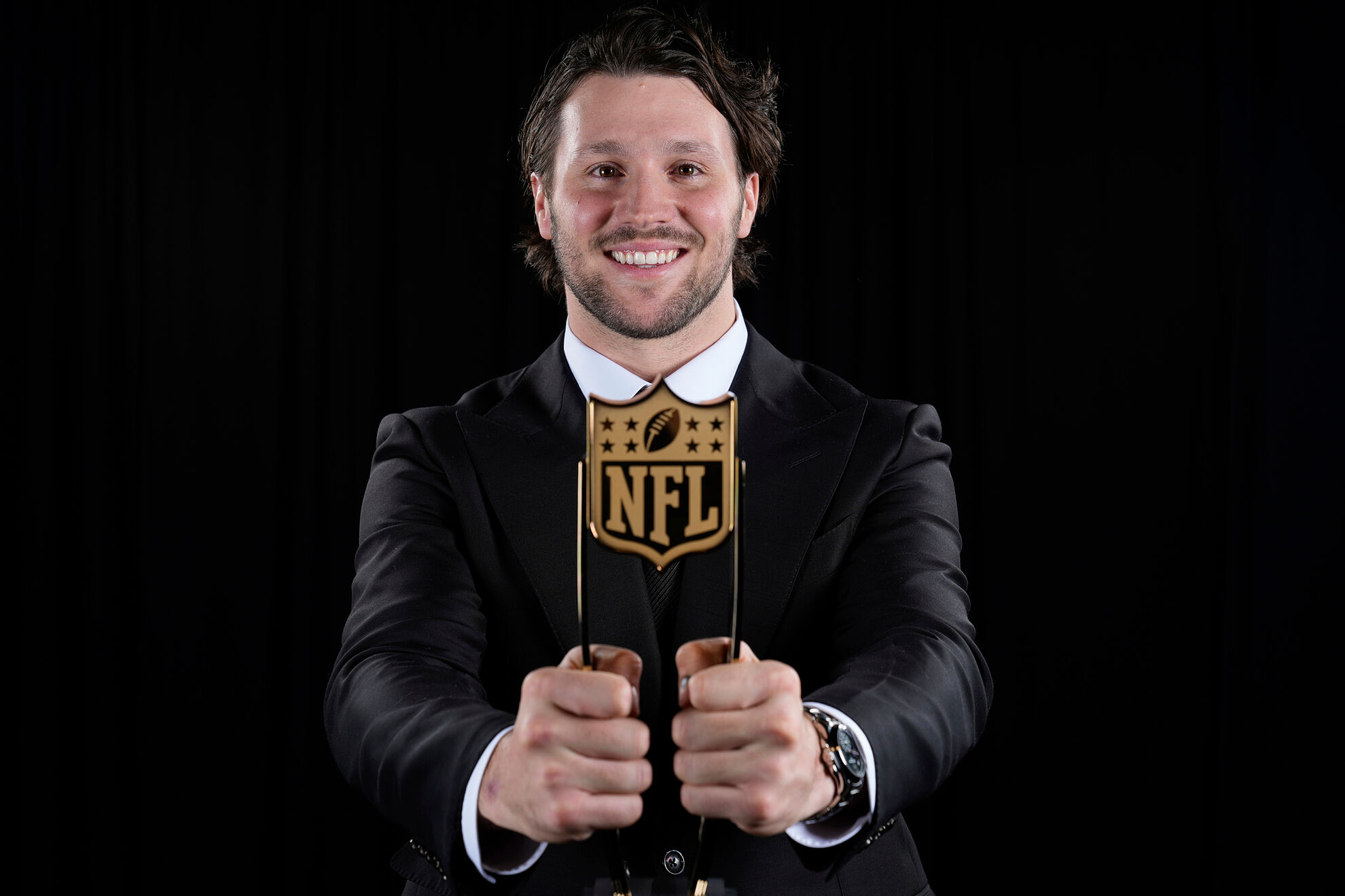 Buffalo Bills' Josh Allen poses after winning the award at the NFL Honors award show ahead of the Super Bowl 59 football game.