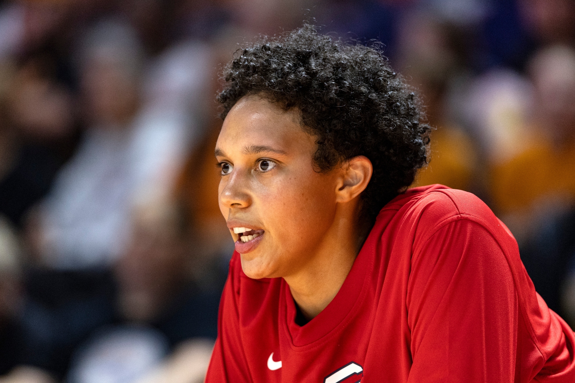 Brittany Griner watches play during the second half of an NCAA college basketball exhibition game.