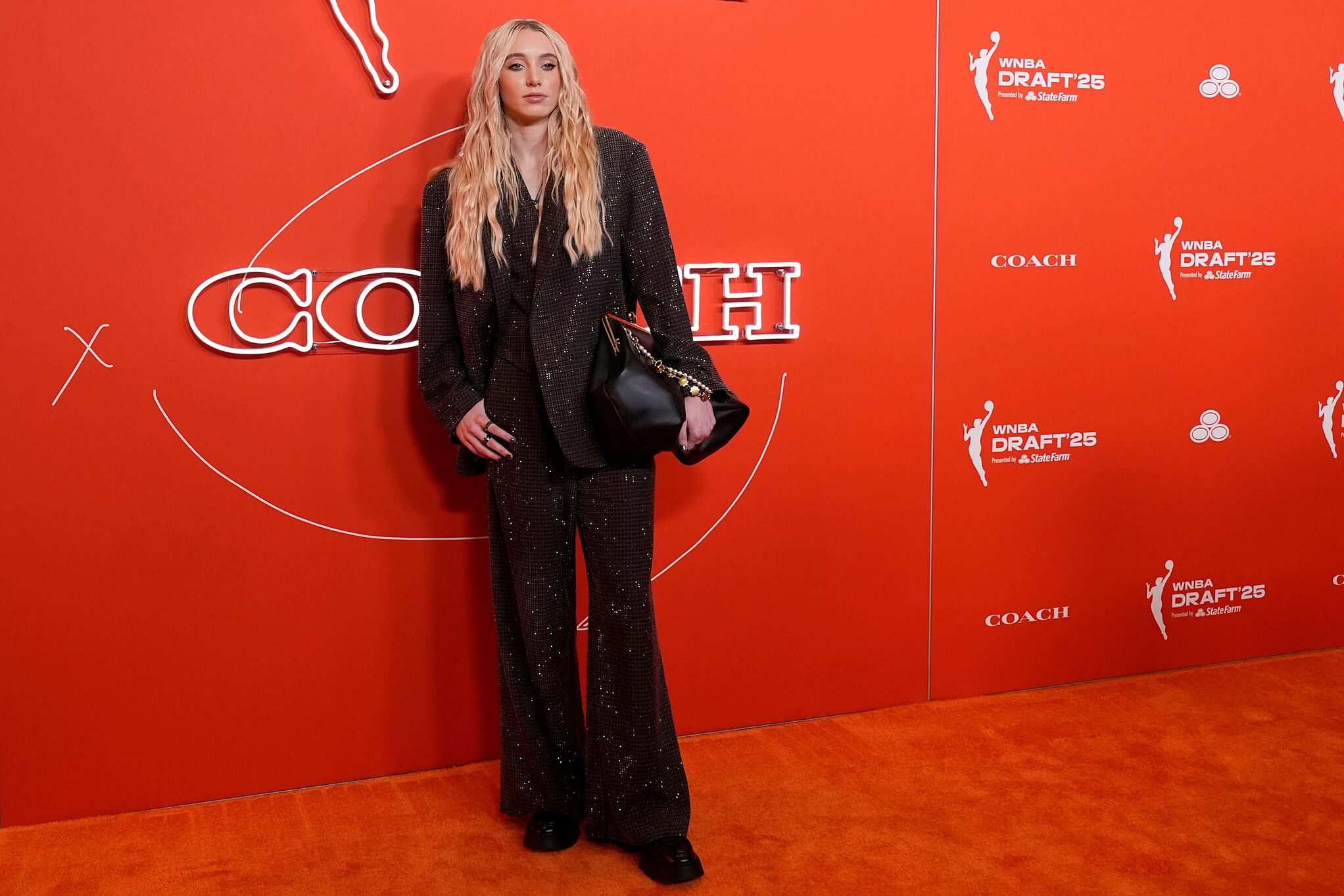 red carpet paige bueckers dress Coach | Draft day has never looked better.  Scenes from #WNBADraft Orange  Carpet presented by Coach. Featuring #PaigeBueckers in a bespoke