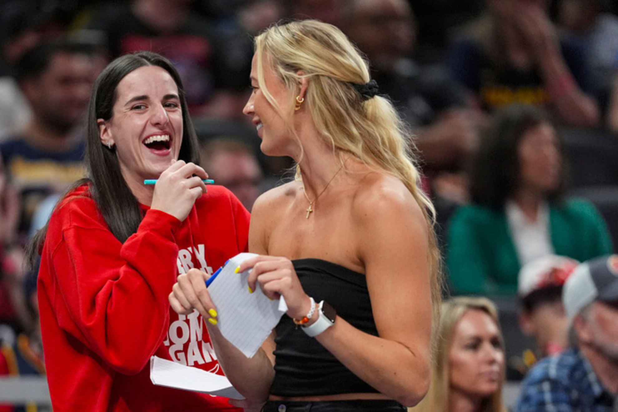 Caitlin Clark reacts to the news of Sophie Cunningham's season-ending injury with the Indiana Fever