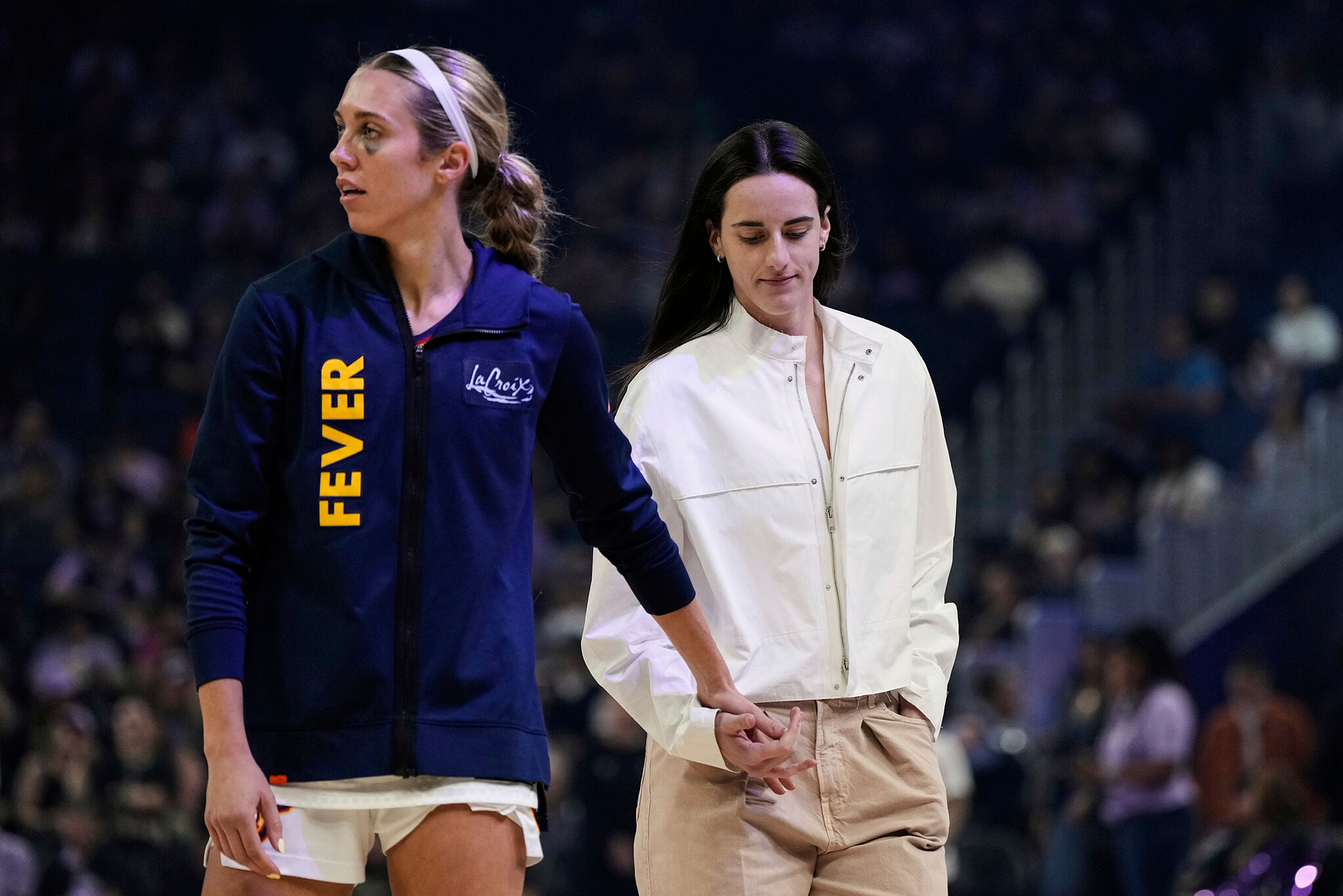 Tyrese Haliburton, Caitlin Clark, and the Indiana Fever players support Lexie Hull through her injury