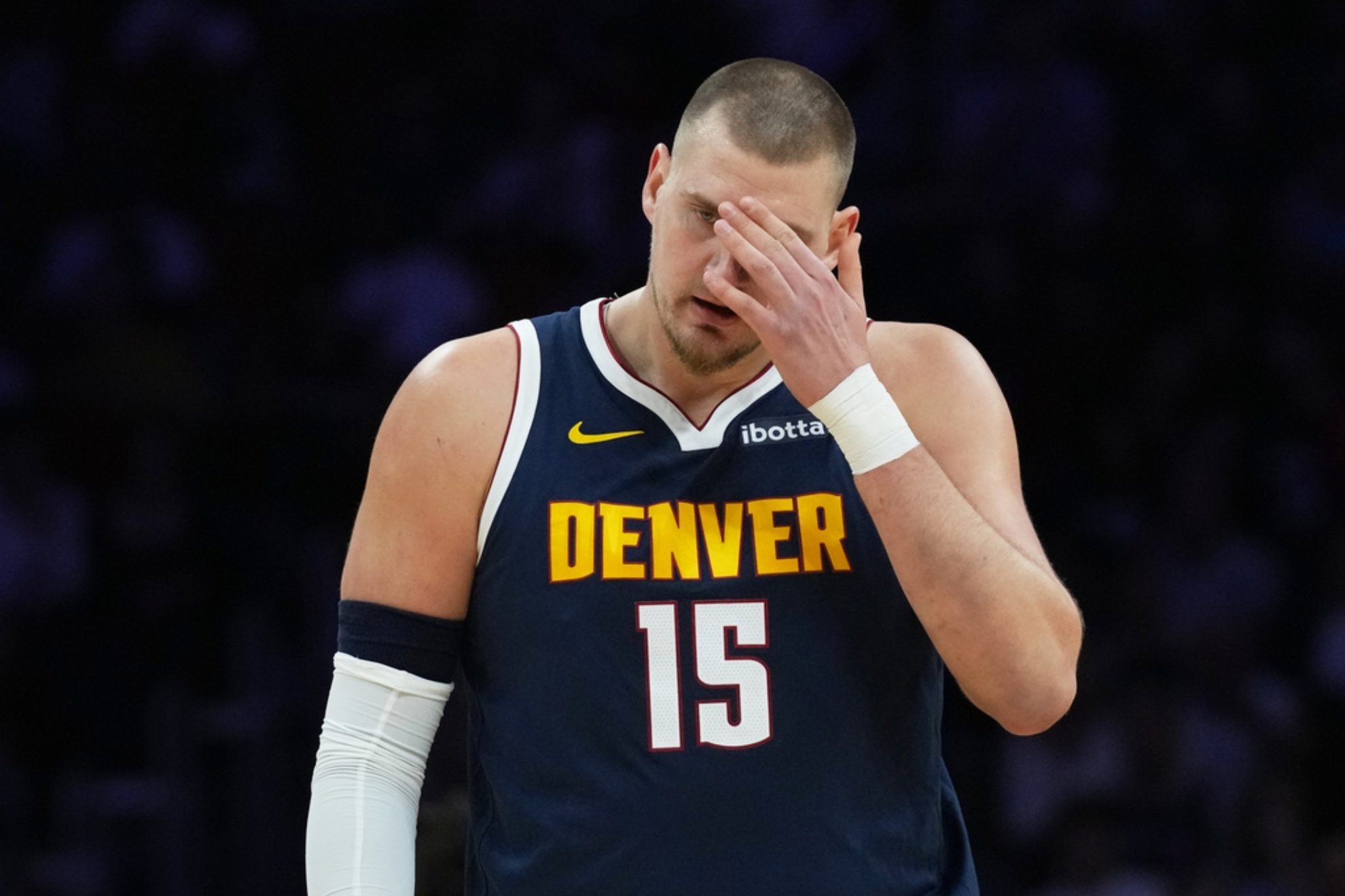 Nikola Jokic left the game against the Heat early as injury concerns mount for Nuggets.