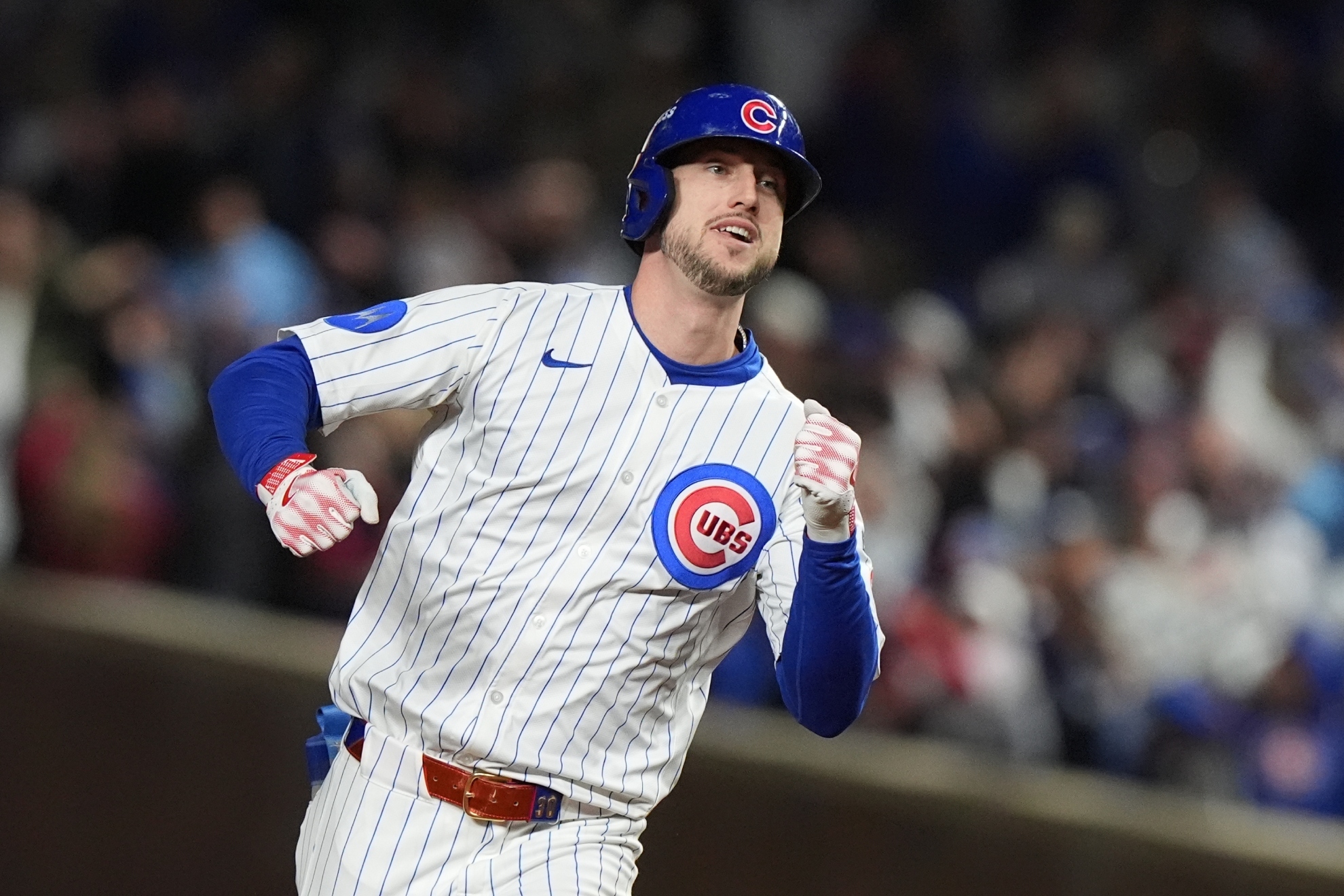 Chicago Cubs' Kyle Tucker (30) runs the bases after hitting a solo home run.