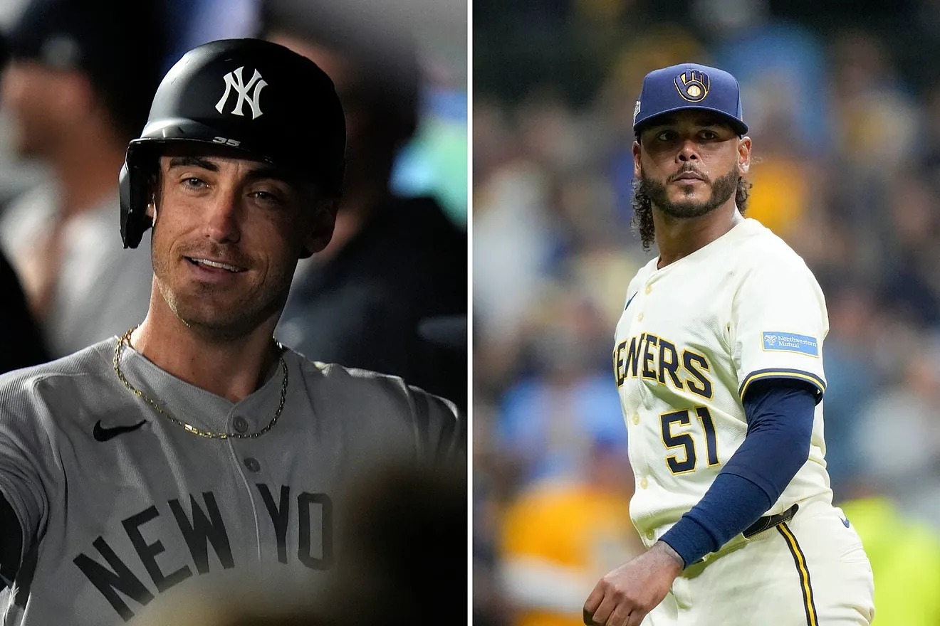 Cody Bellinger of the New York Yankees celebrates in the dugout after his solo home run.