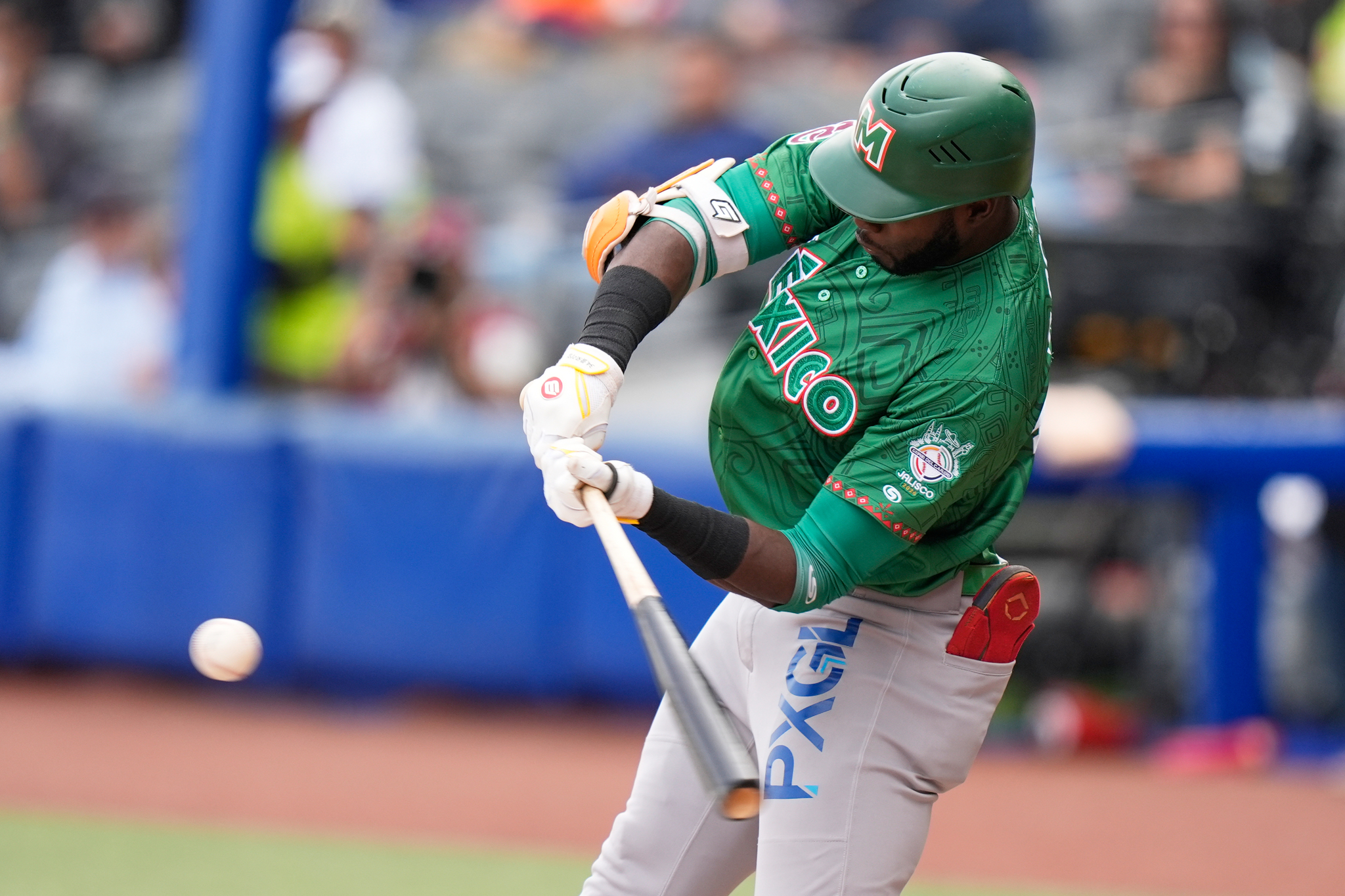 Mexico Green's Estevan Florial hits a three runs home run against Dominican Republic during a  Caribbean Series baseball game in Guadalajara, Mexico, Friday, Feb. 6, 2026
