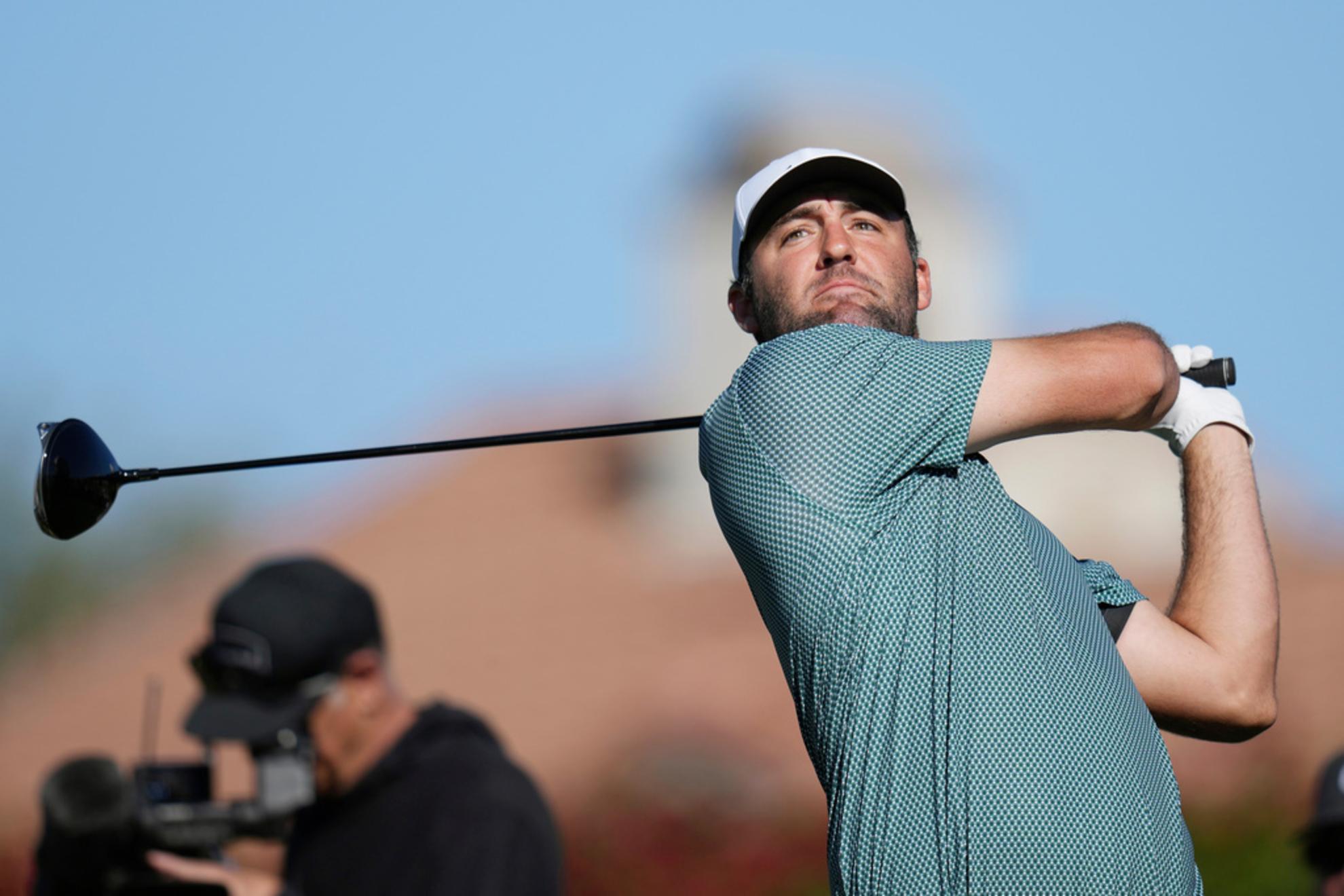 McIlroy says Scheffler's consistency matches Tiger's prime years.