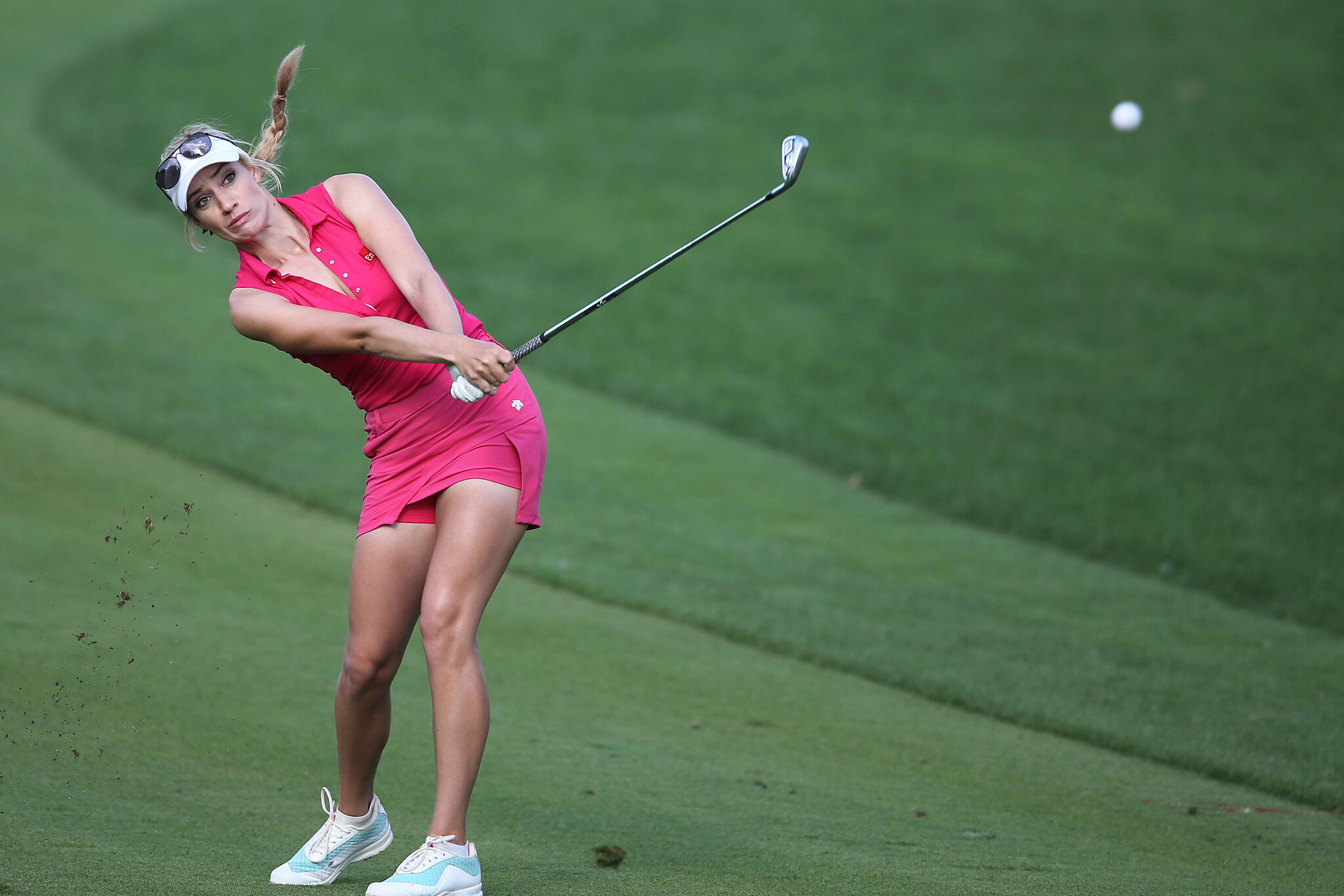 Paige, playing golf