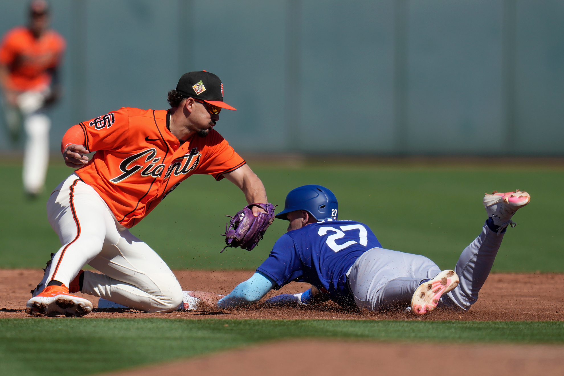 Los Angeles Dodgers' Mike Siani steals second base as San Francisco Giants shortstop Willy Adames