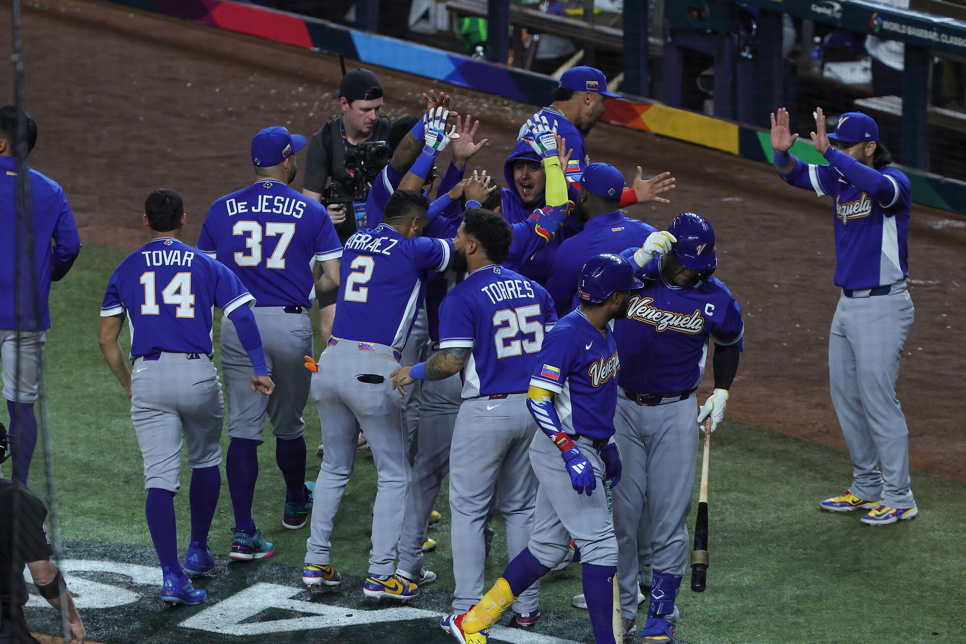 Venezuela's Wilyer Abreu celebrates with teammates