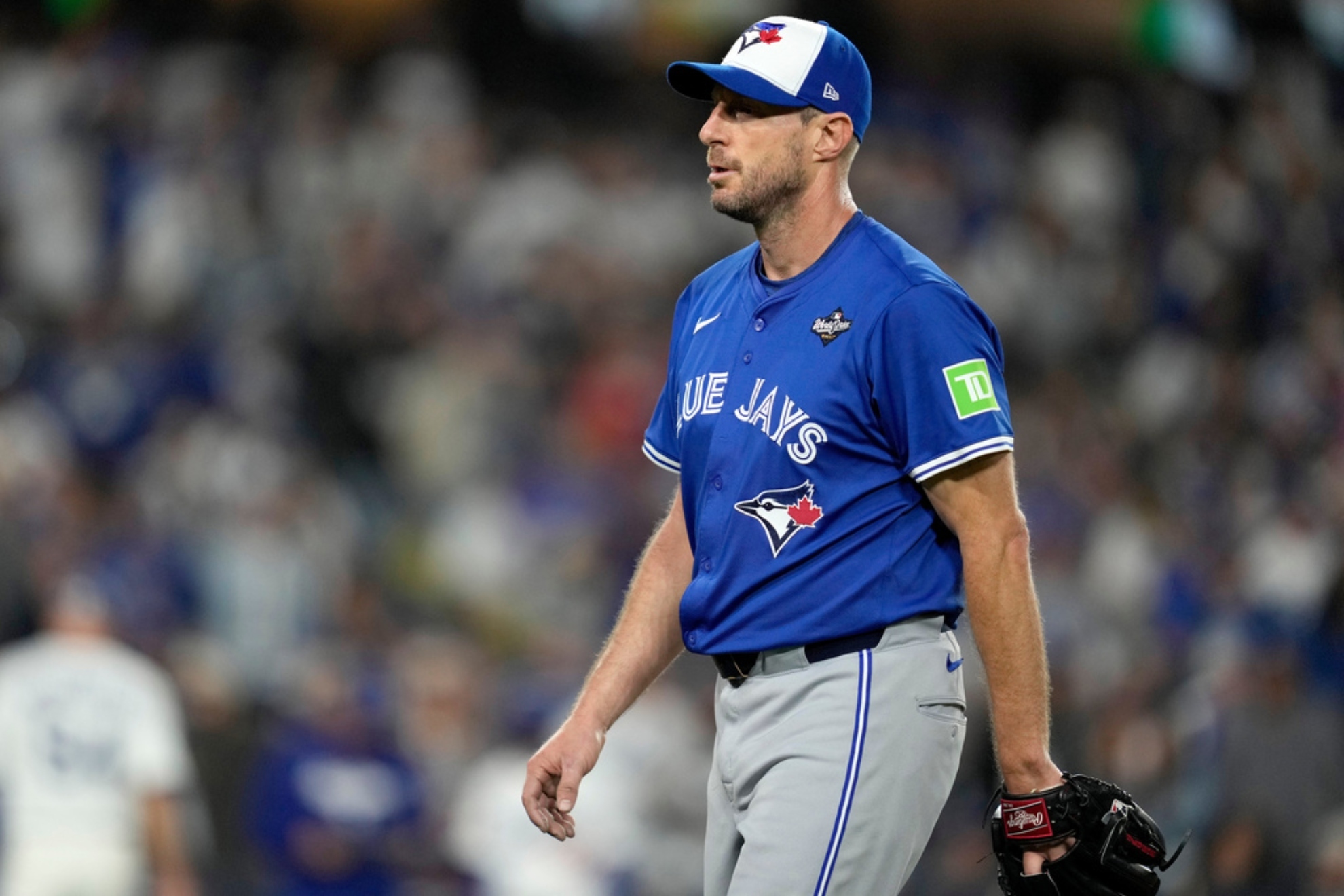 Toronto Blue Jays pitcher Max Scherzer leaves the game.