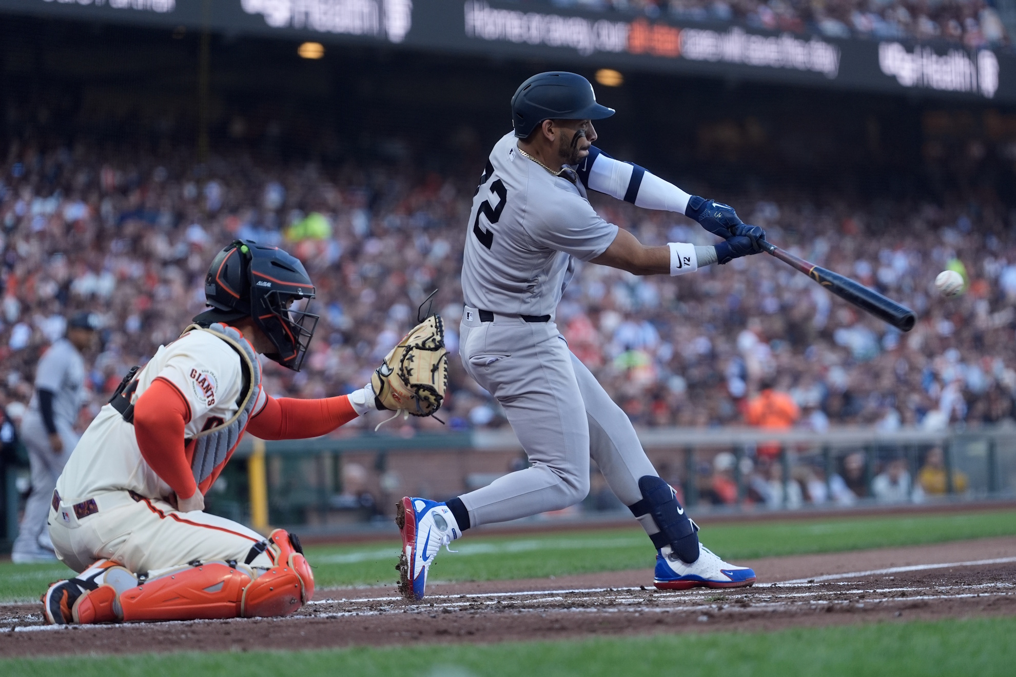 José Caballero hits an RBI double in front of Patrick Bailey.