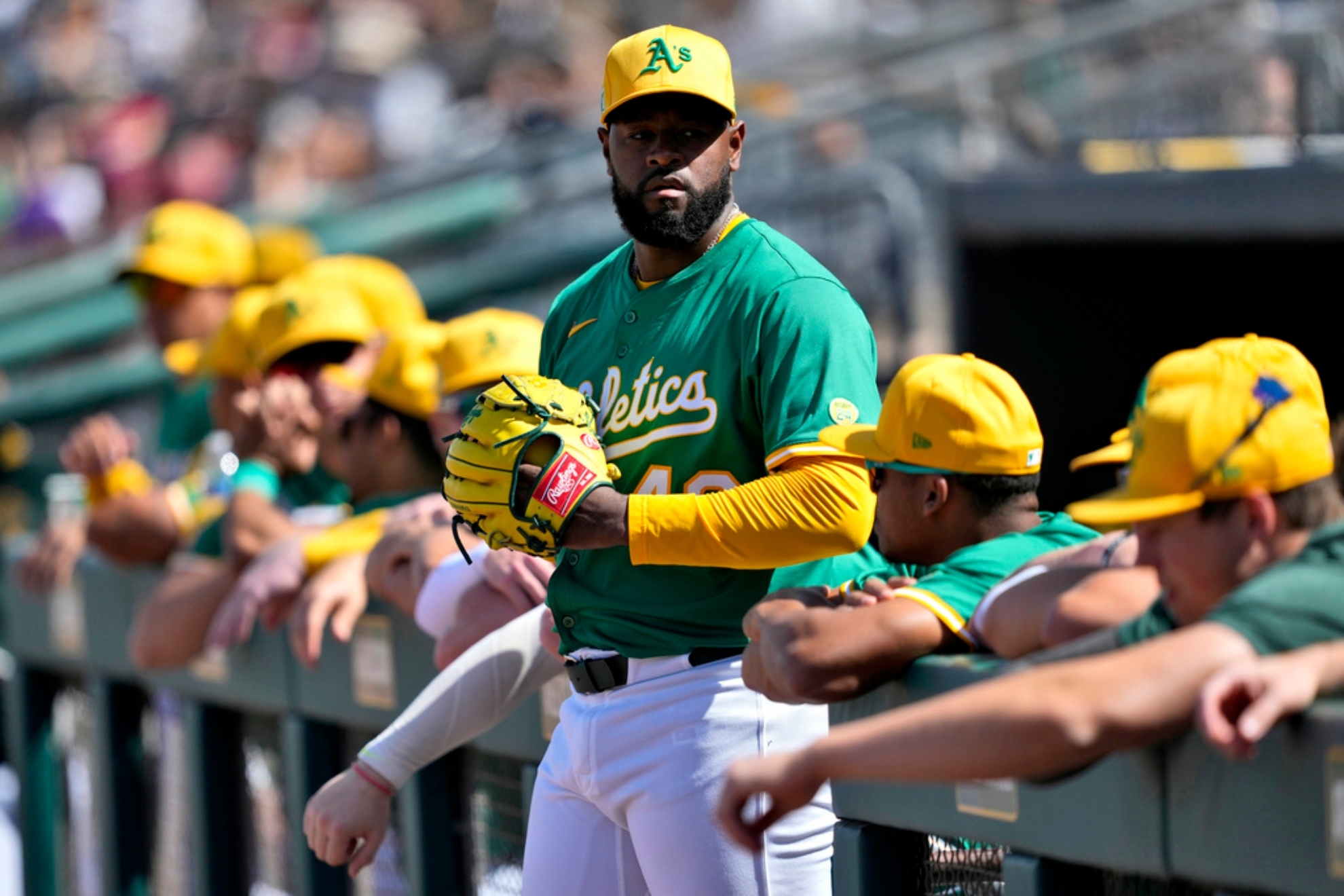 Athletics pitcher Luis Severino waits to take the field prior to a spring training baseball game against the San Diego Padres.
