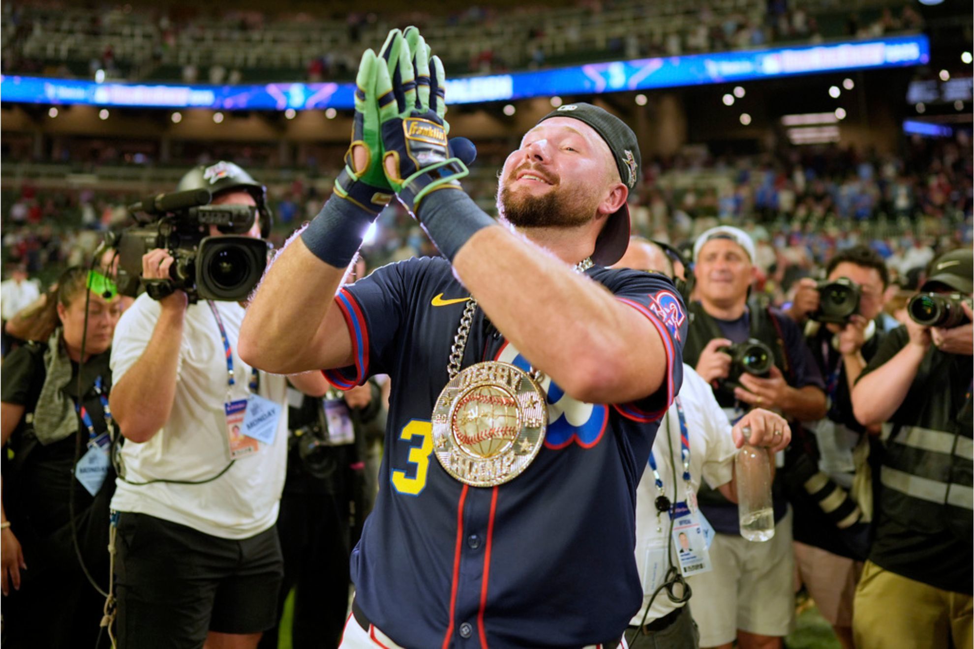 Seattle Mariners' Cal Raleigh celebrates after winning the MLB baseball All-Star Home Run Derby
