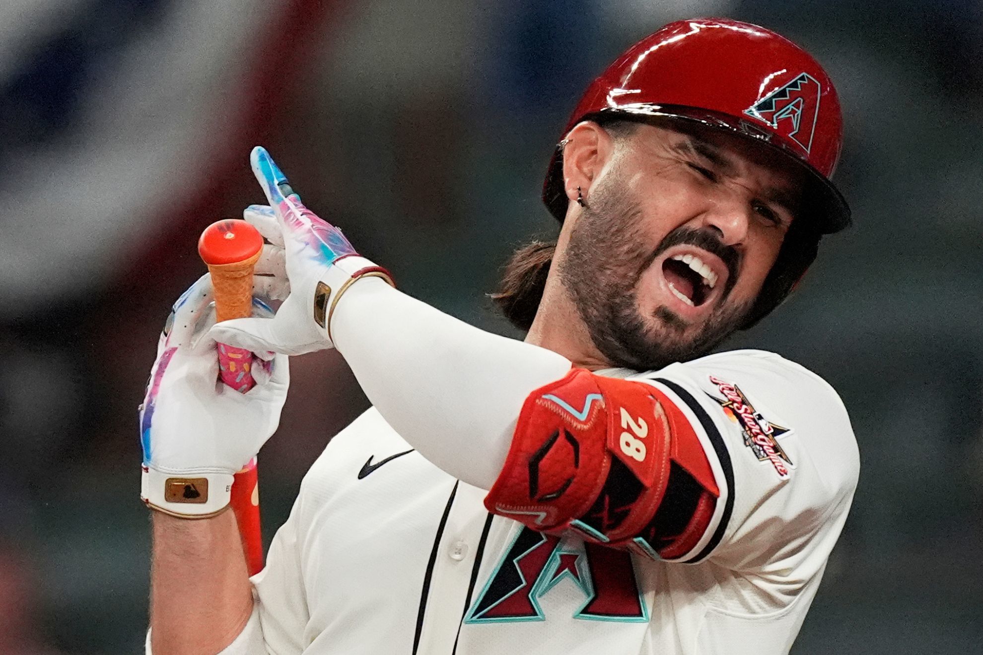 Arizona Diamondbacks' Eugenio Suárez gets hit by a pitch during eighth inning at the MLB baseball All-Star game between the American League and National League