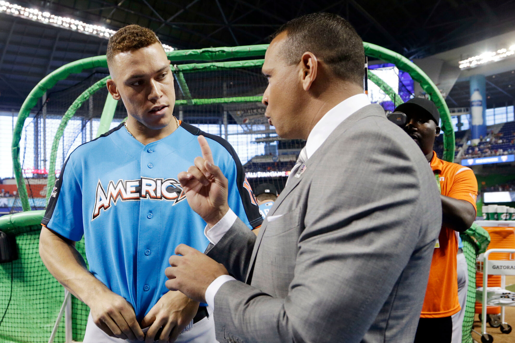 American League's New York Yankees Aaron Judge (99), left, listens to former player Alex Rodriguez, prior to the MLB baseball All-Star Game, Tuesday, July 11, 2017, in Miami.