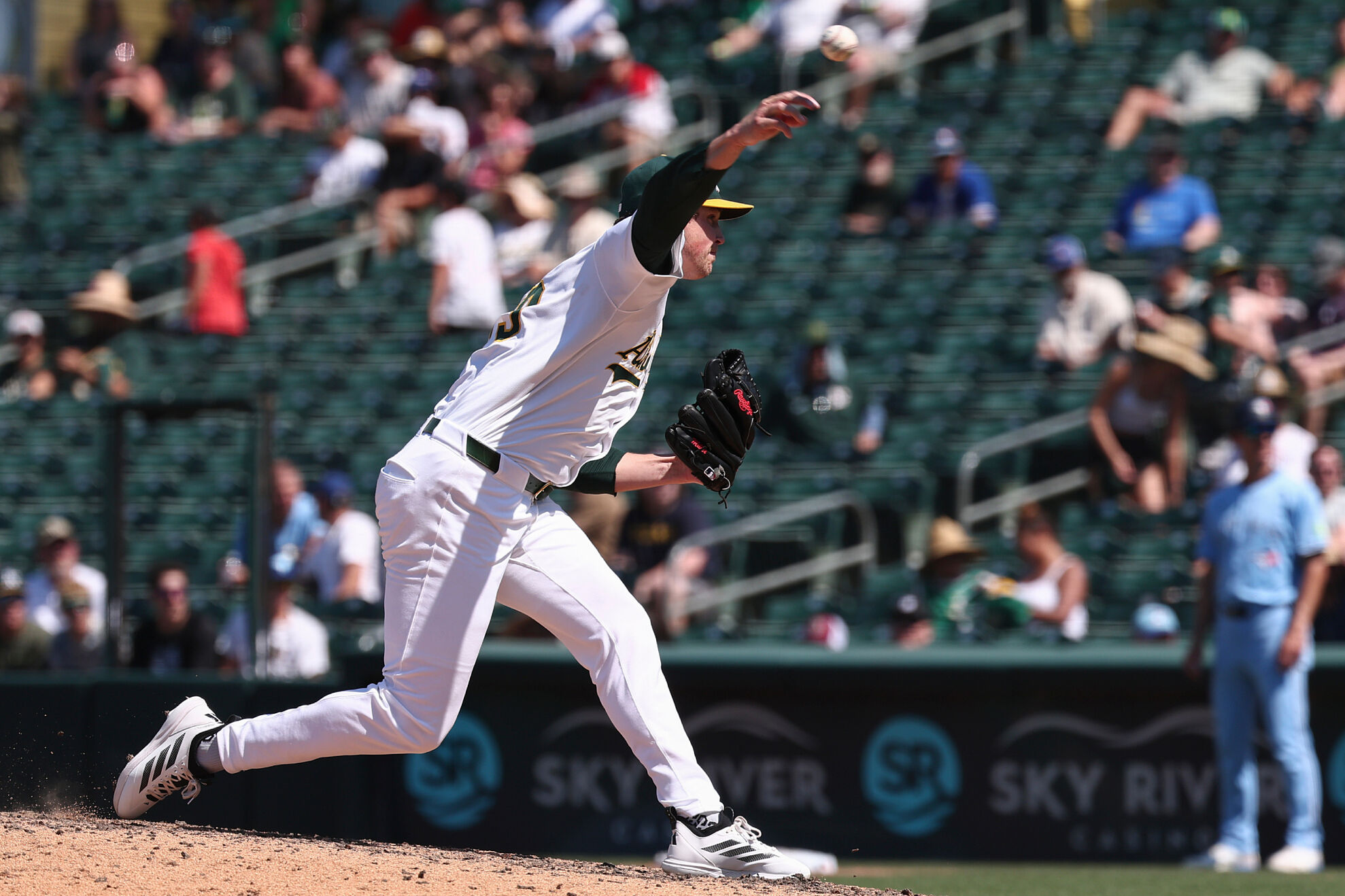 Athletics pitcher Mason Miller throws to the Toronto Blue Jays during the ninth inning of a baseball game Sunday, July 13, 2025, in West Sacramento, Calif.